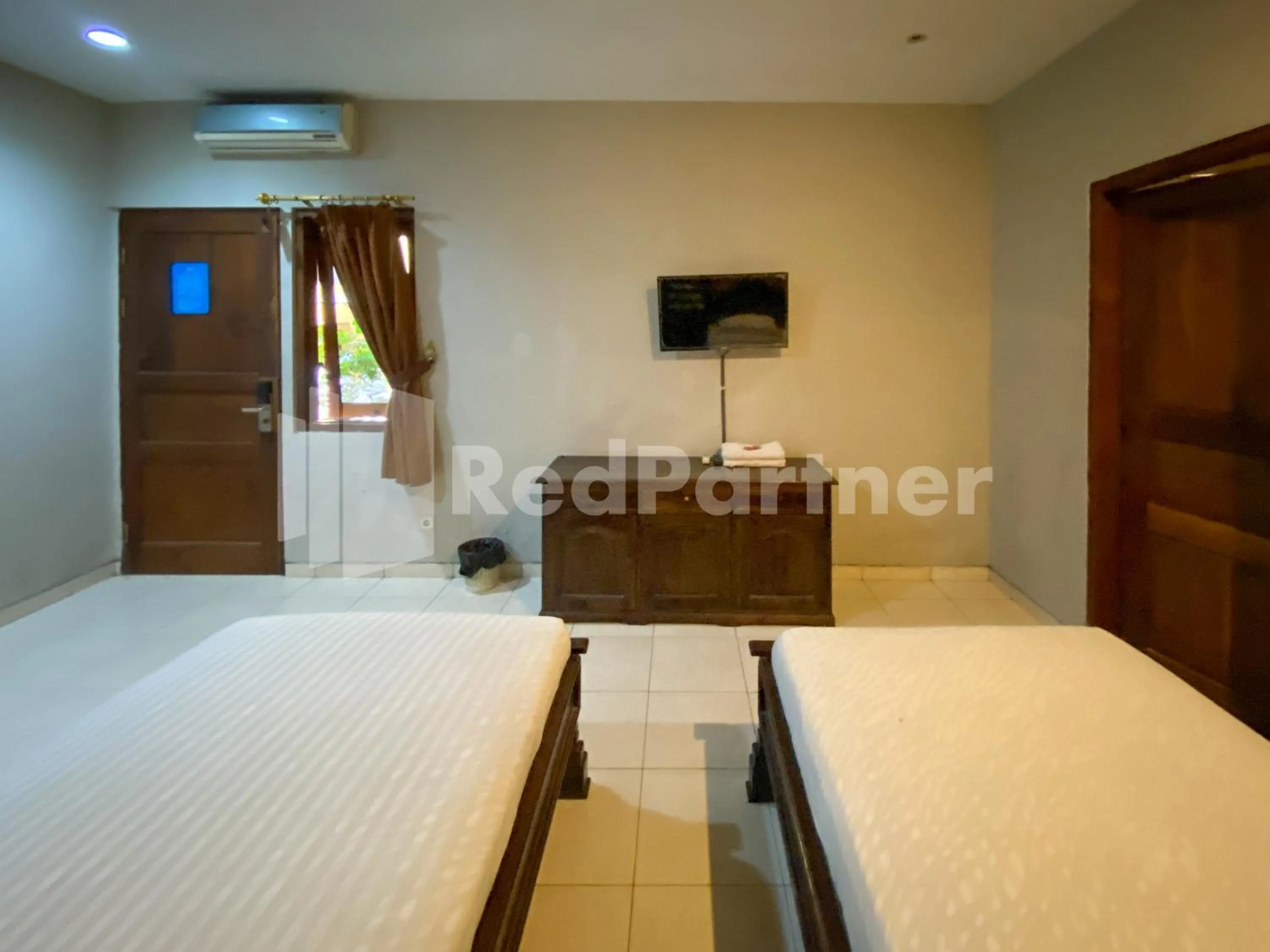 Bed in Istana Griya 2 Hotel Solo RedPartner