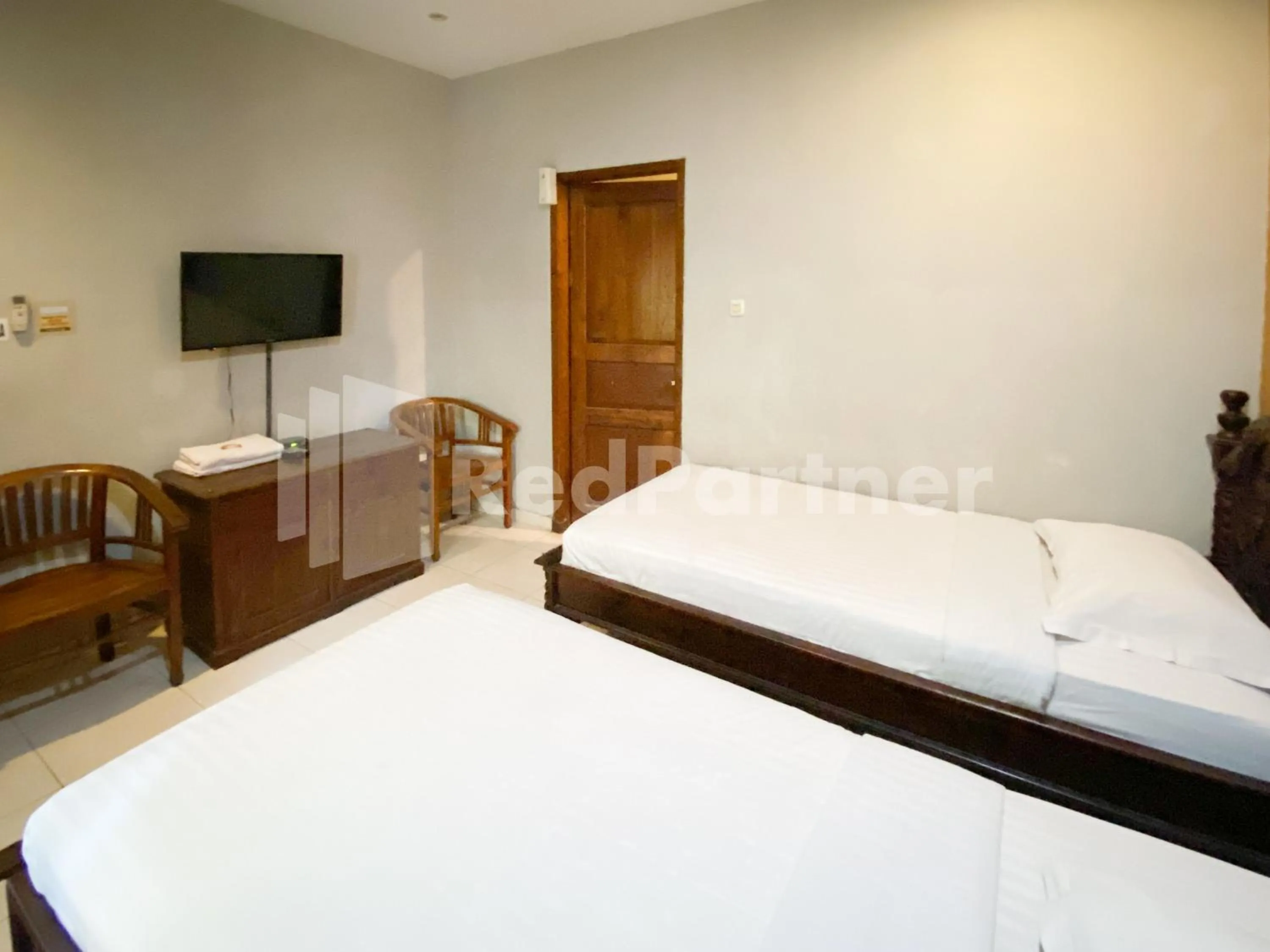 Bed in Istana Griya 2 Hotel Solo RedPartner