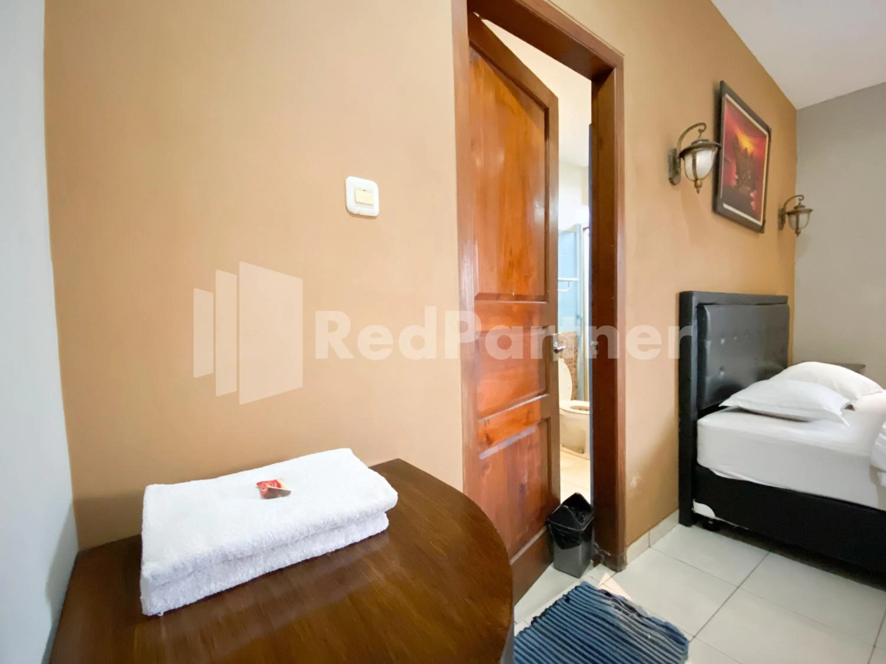 Bed in Istana Griya 2 Hotel Solo RedPartner