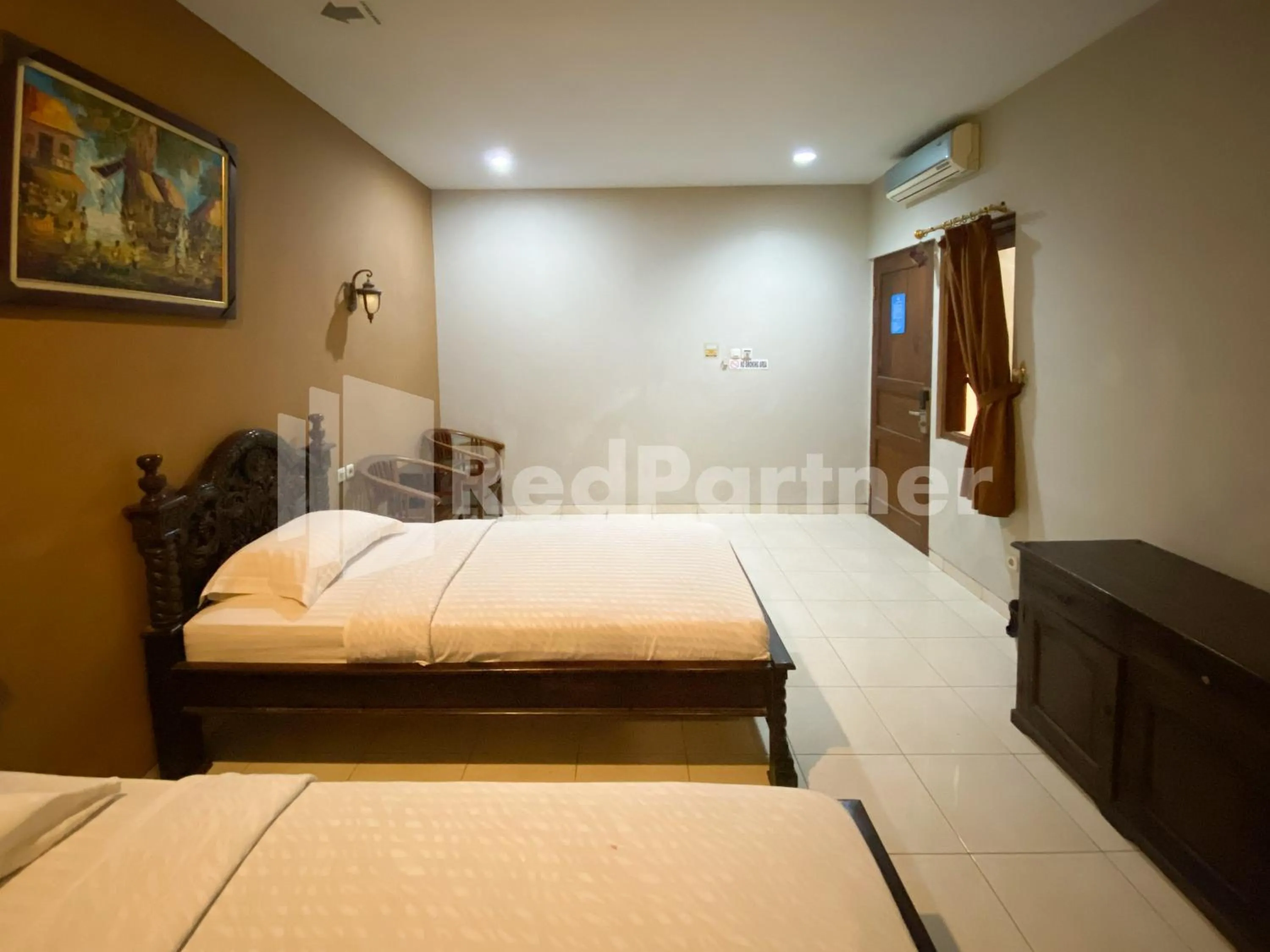 Bed in Istana Griya 2 Hotel Solo RedPartner