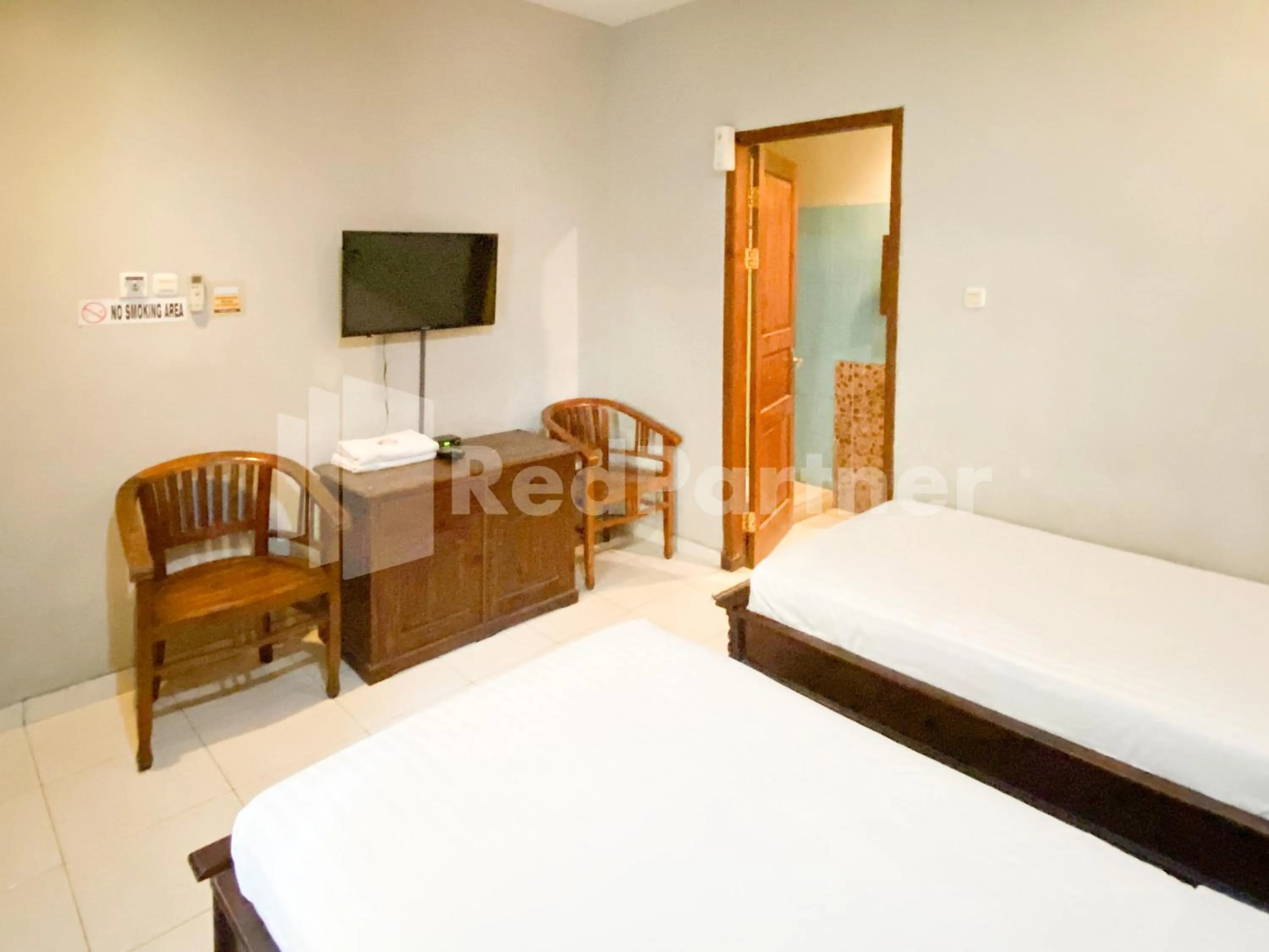 Bed in Istana Griya 2 Hotel Solo RedPartner
