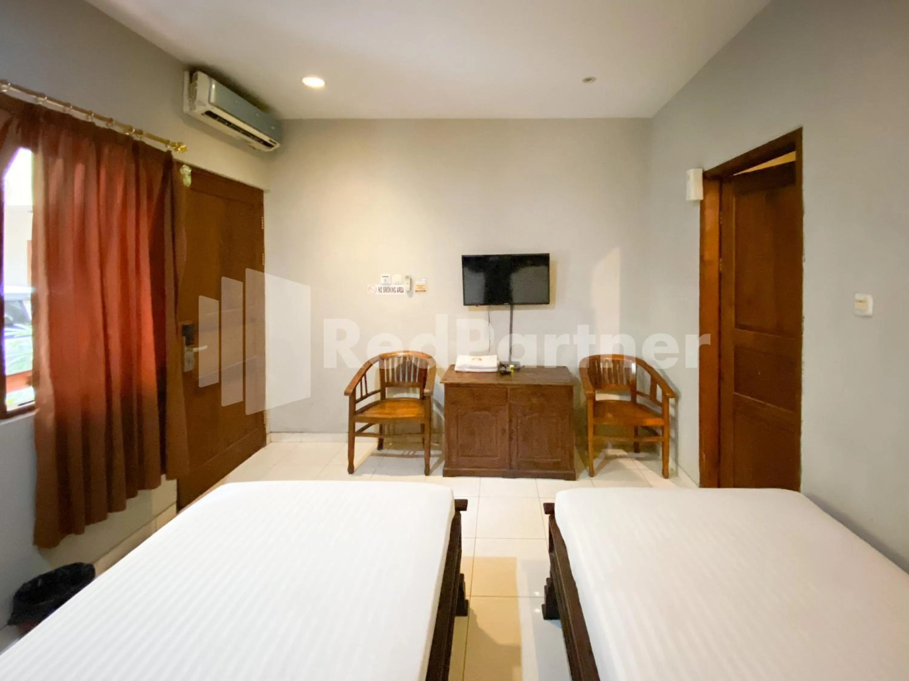 Bed in Istana Griya 2 Hotel Solo RedPartner