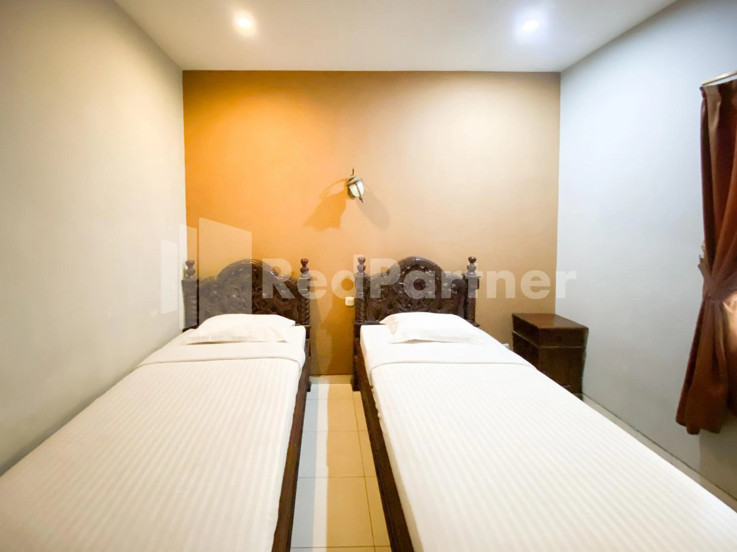 Bed in Istana Griya 2 Hotel Solo RedPartner