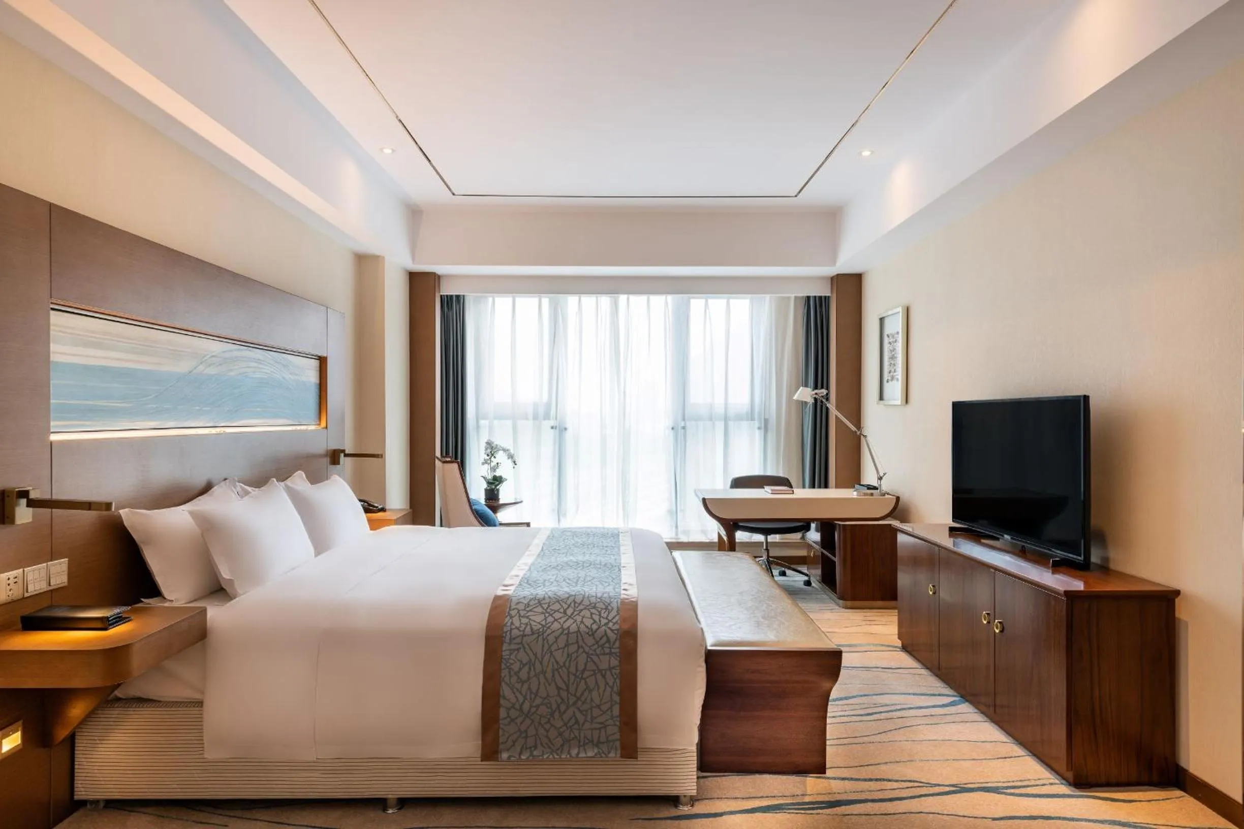 Bed in Novotel Qingdao New Hope