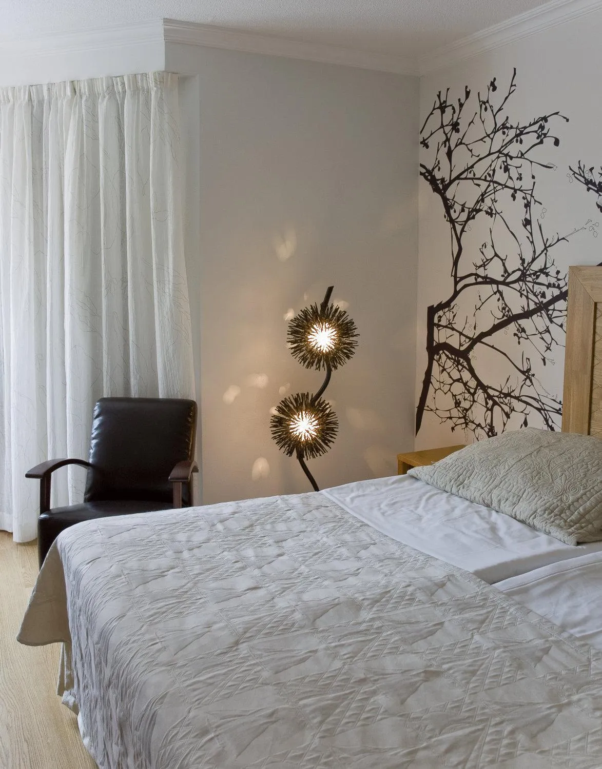 Bed, TV/Entertainment Center in Hotel Rivoli Jardin