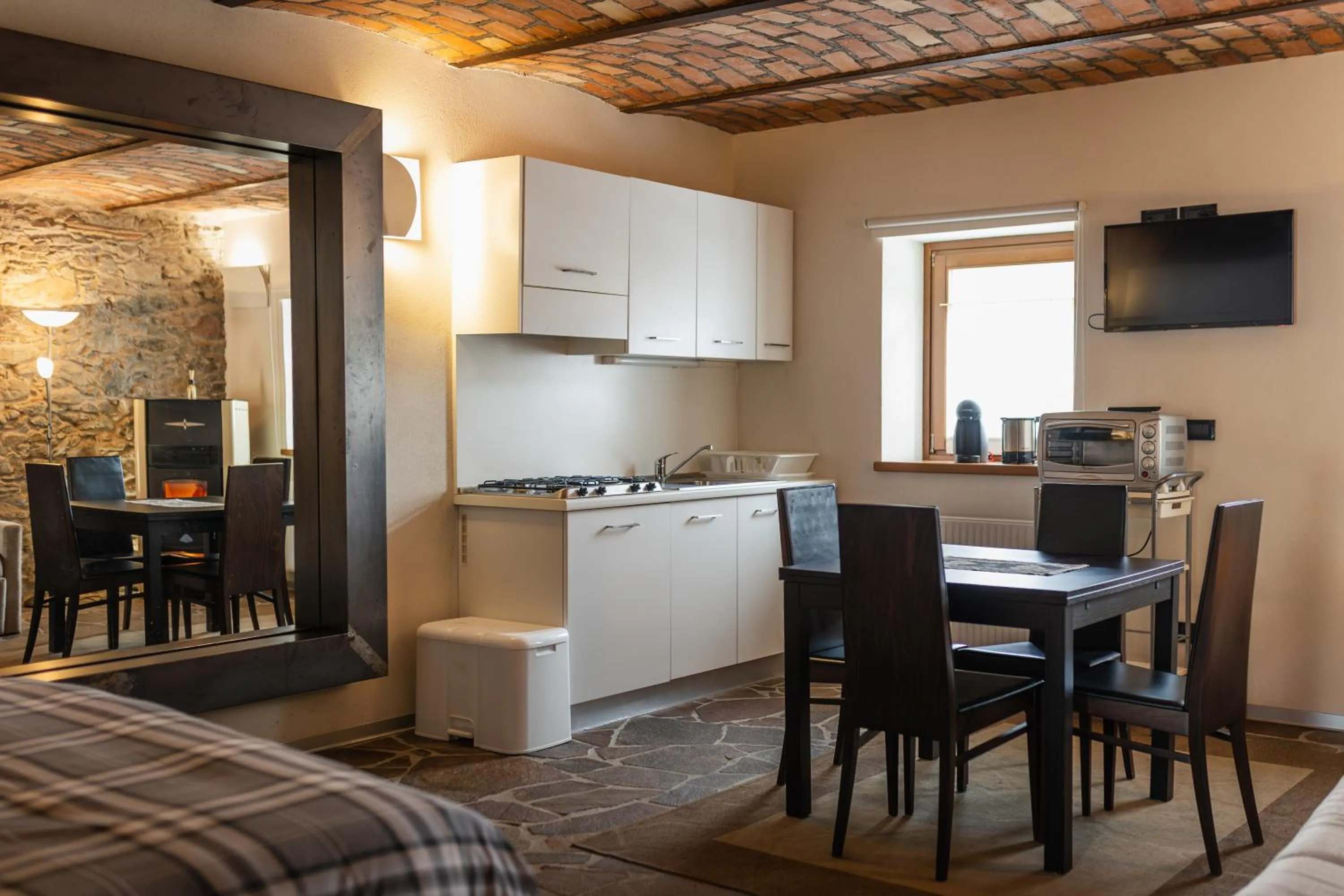 kitchen in Albergo Diffuso Comeglians