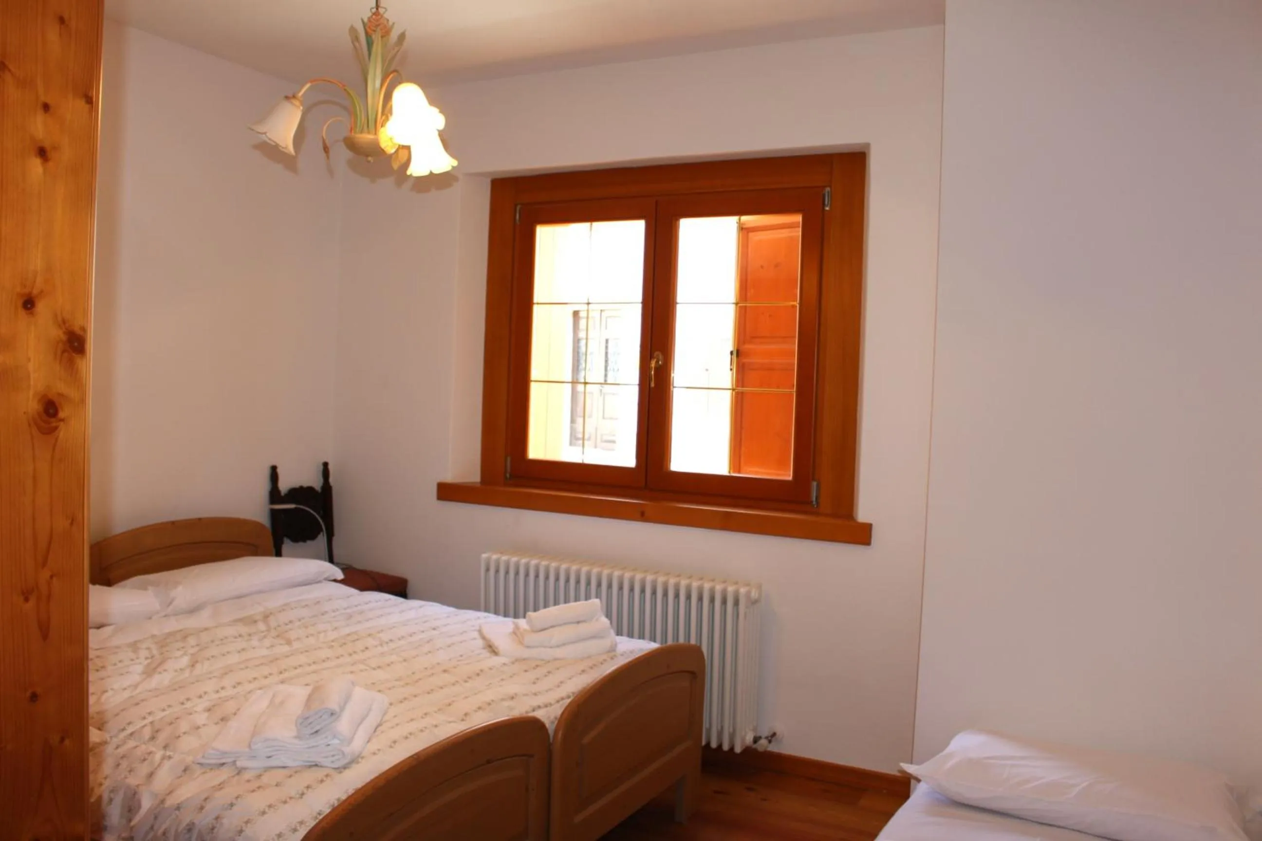 Bed in Albergo Diffuso Comeglians