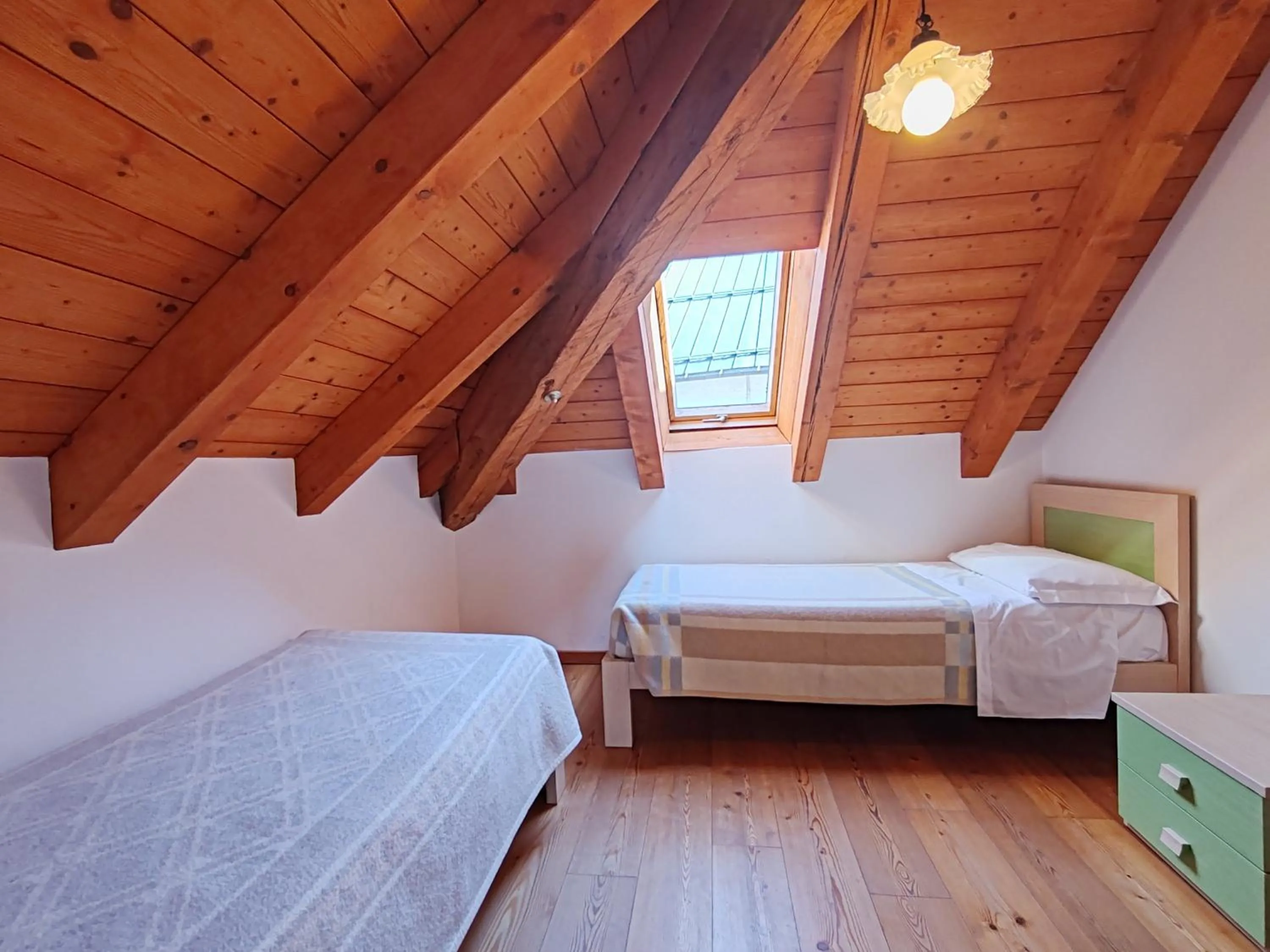 Bed in Albergo Diffuso Comeglians