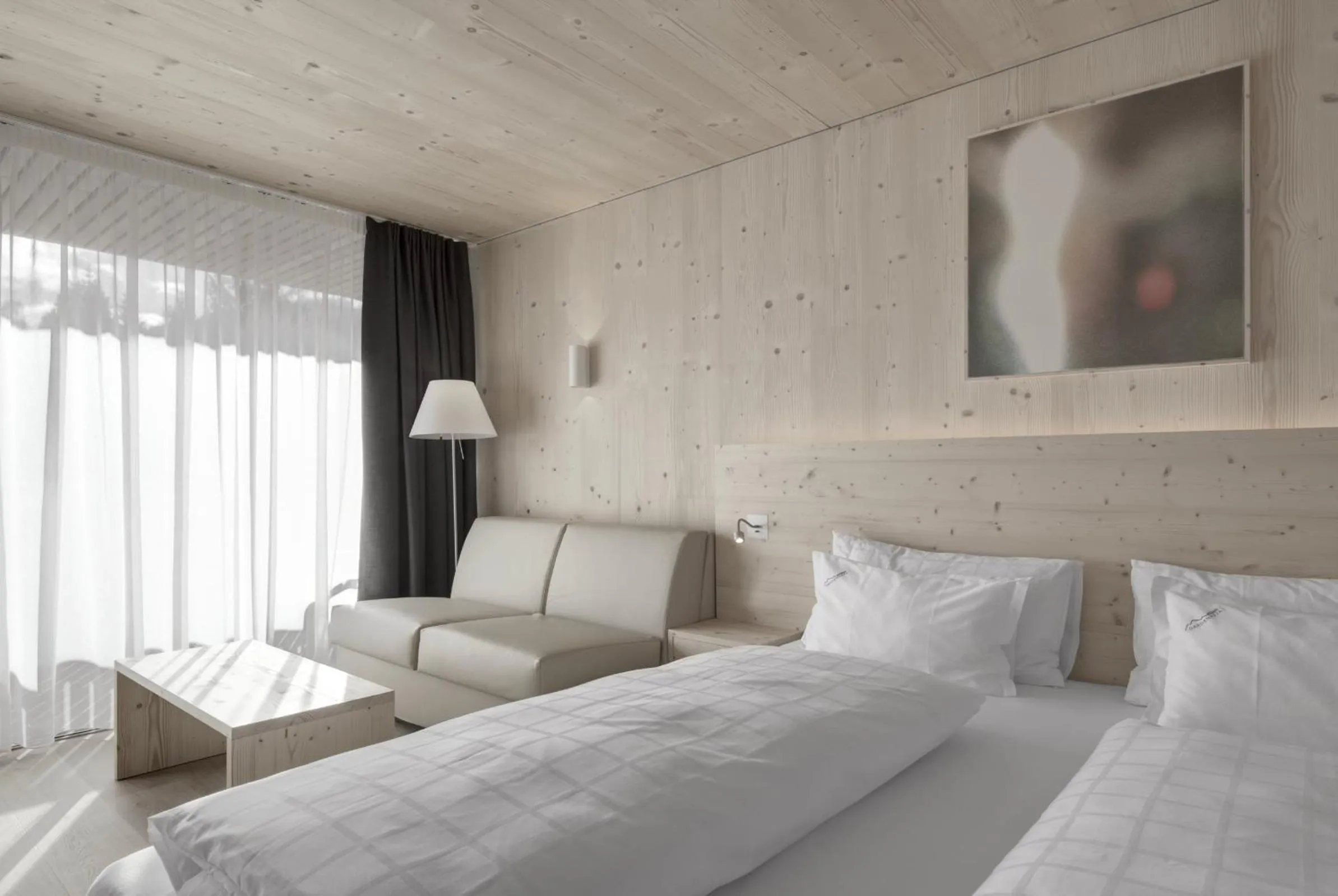 Living room, Bed in Hotel Gardenazza