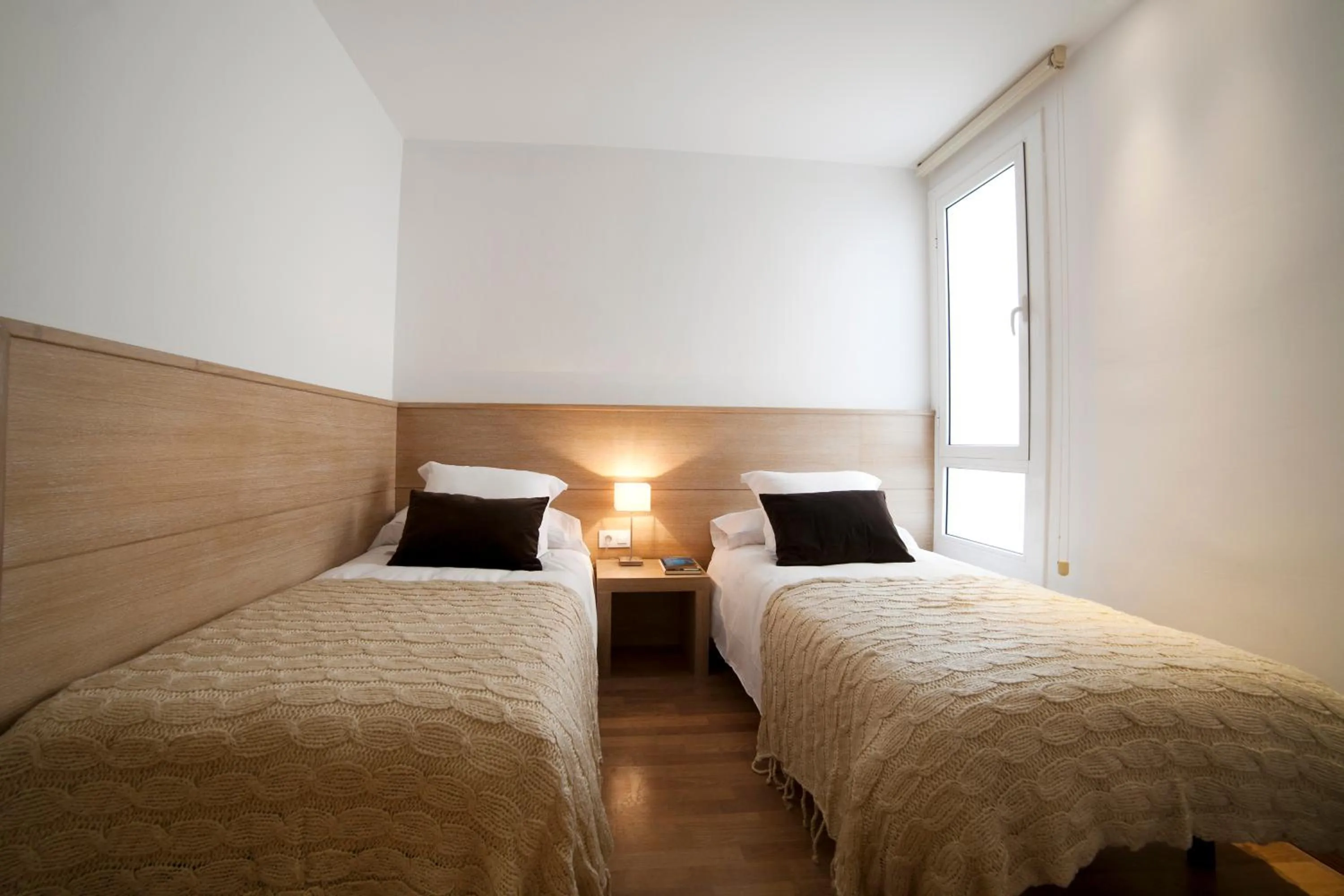 Photo of the whole room, Bed in Serennia Apartamentos Ramblas - Plaça Catalunya