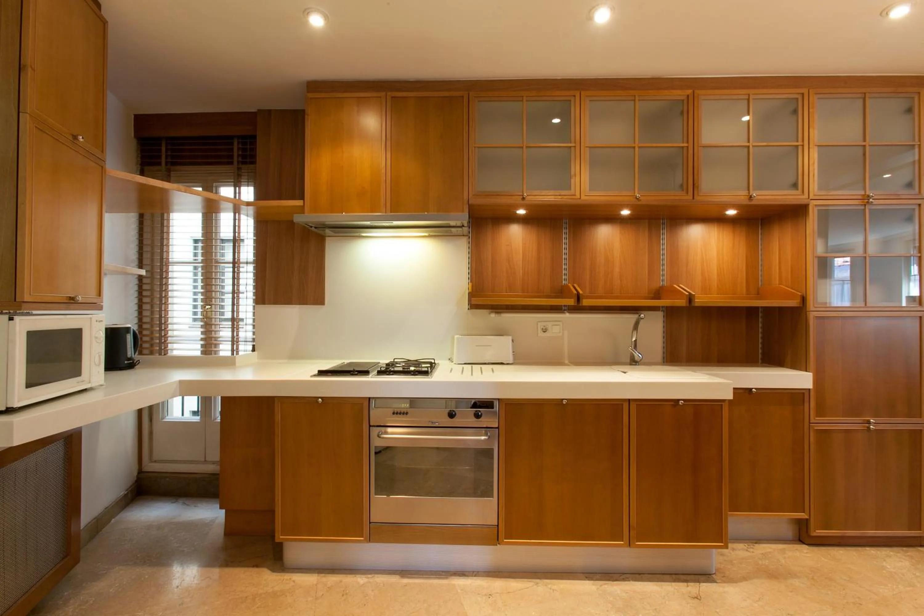 Kitchen or kitchenette in Serennia Apartamentos Ramblas - Plaça Catalunya