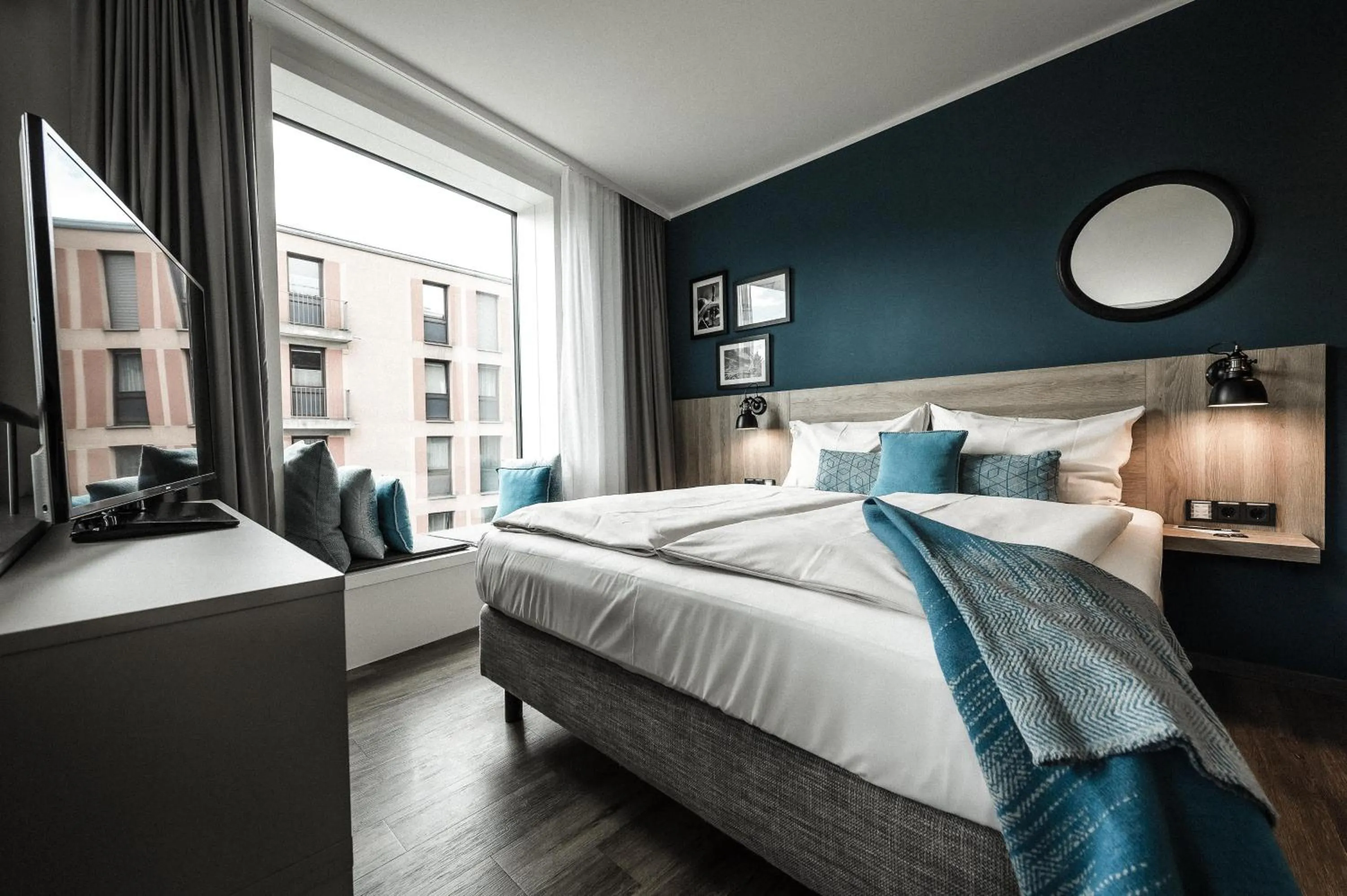 Photo of the whole room, Bed in HARBR Hotel Konstanz, a member of Radisson Individuals