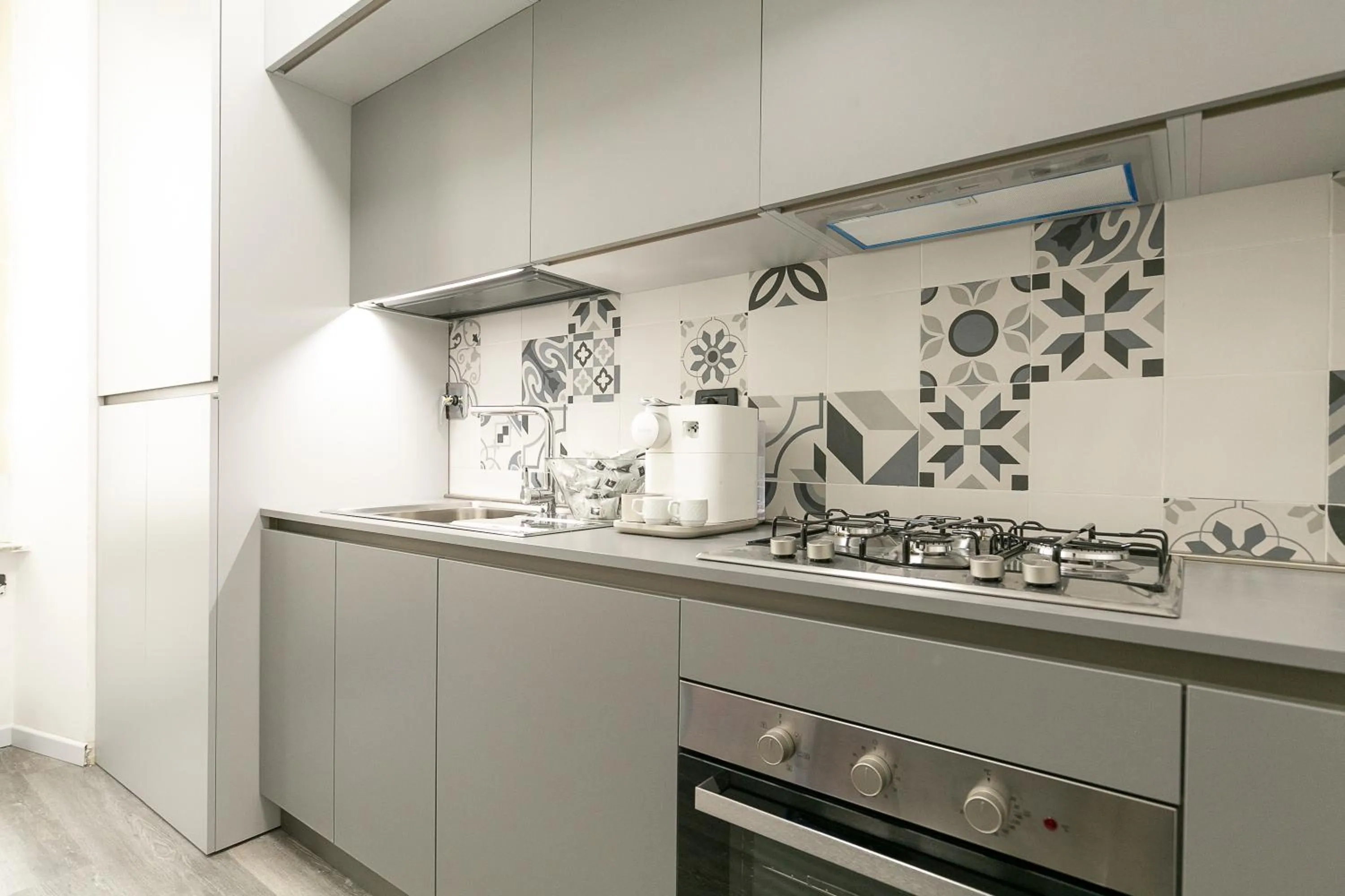 Communal kitchen in Capitolium Rooms