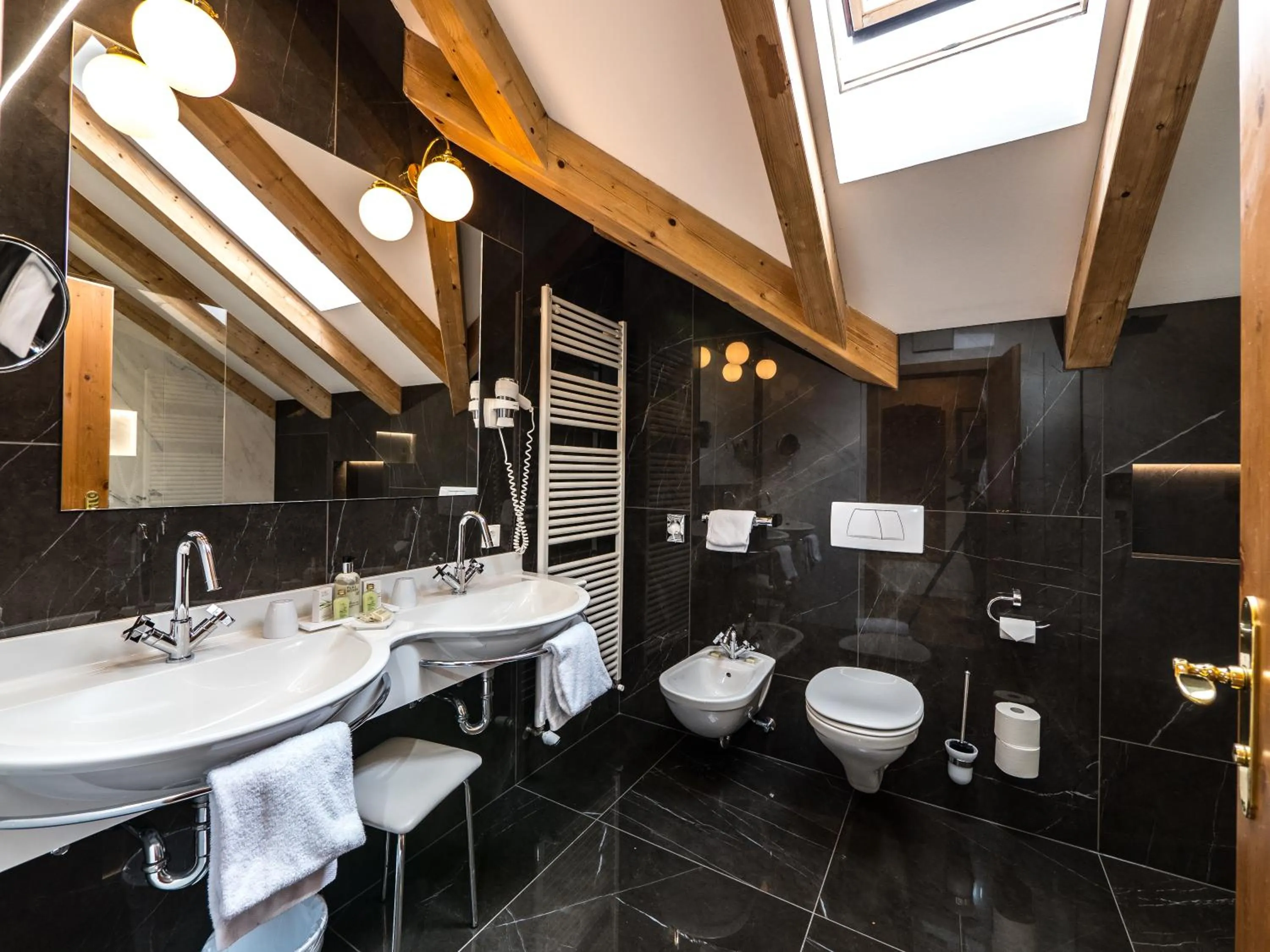 Bathroom in Alpin & Vital Hotel La Perla