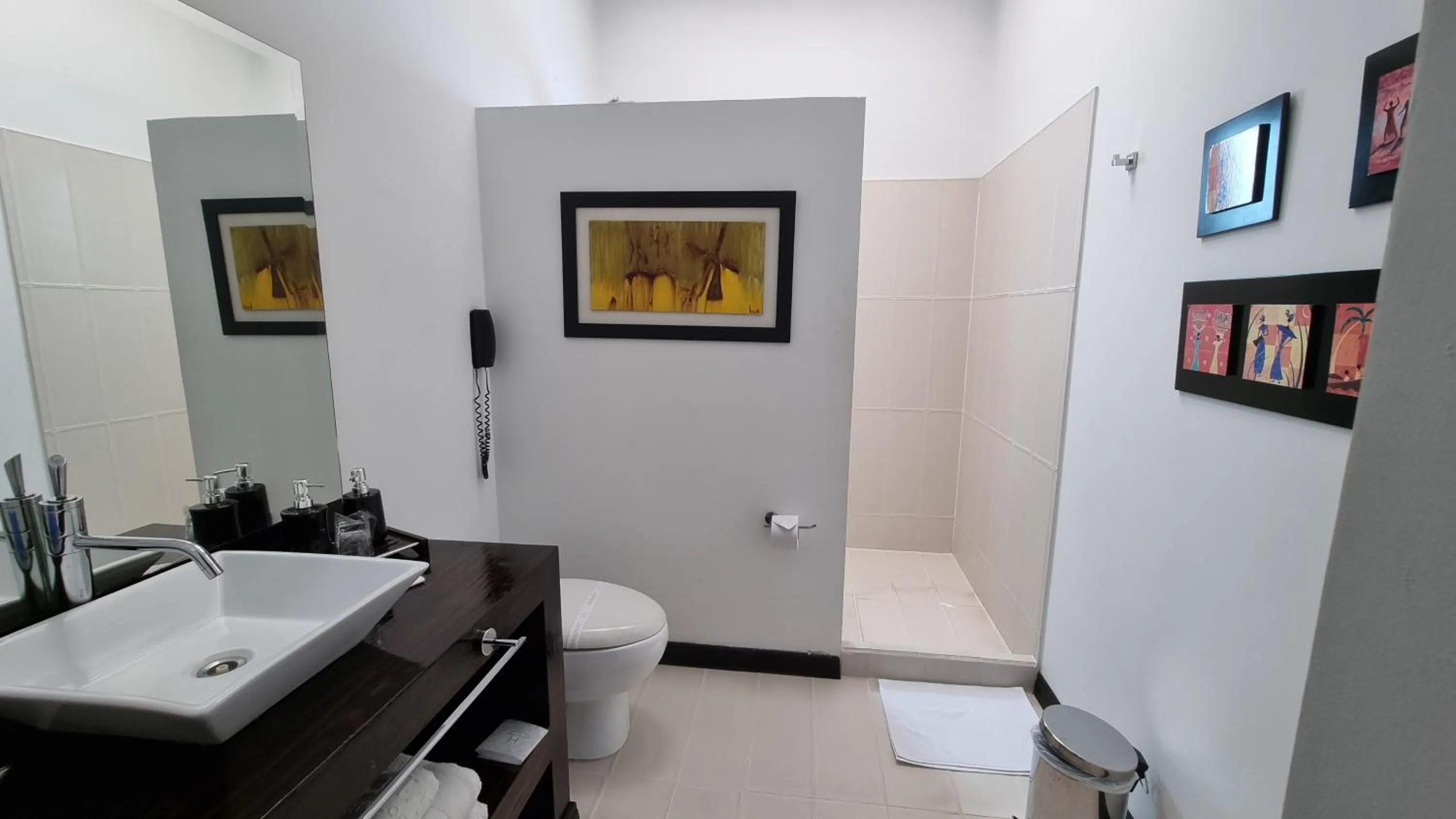 Bathroom in Habitat Suites Hotel By GHO Hoteles