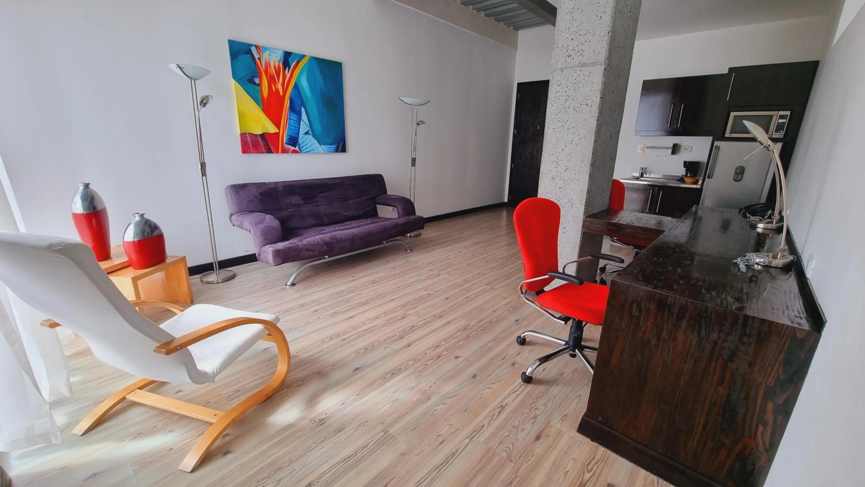 Living room in Habitat Suites Hotel By GHO Hoteles