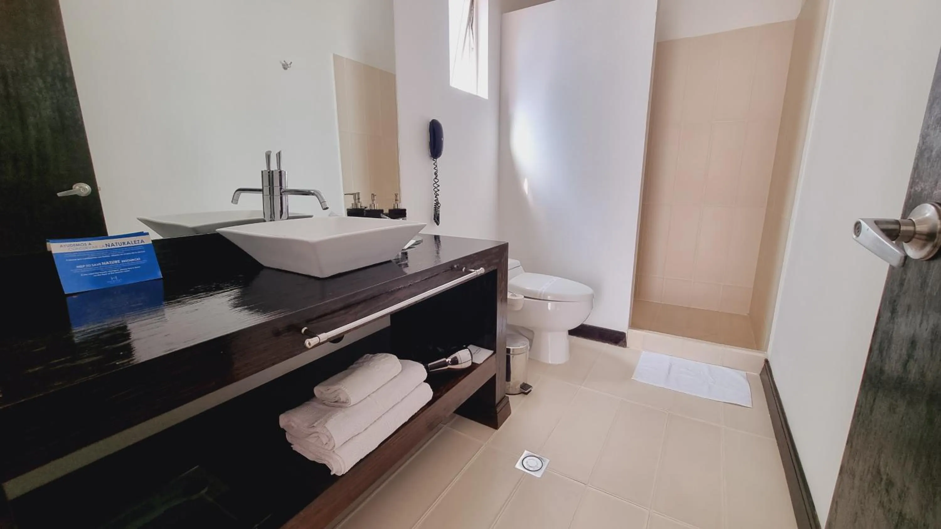 Bathroom in Habitat Suites Hotel By GHO Hoteles