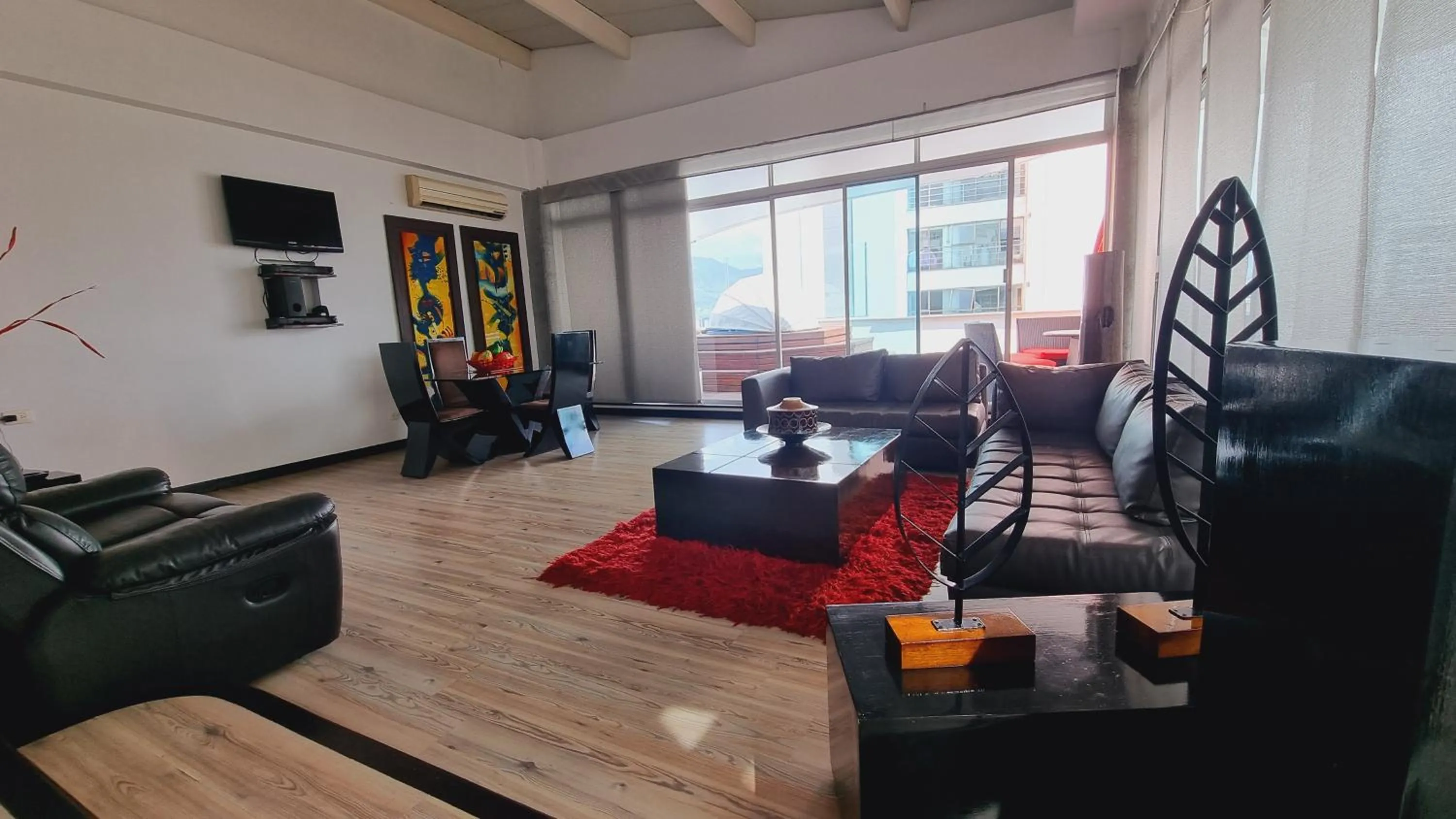 Living room in Habitat Suites Hotel By GHO Hoteles