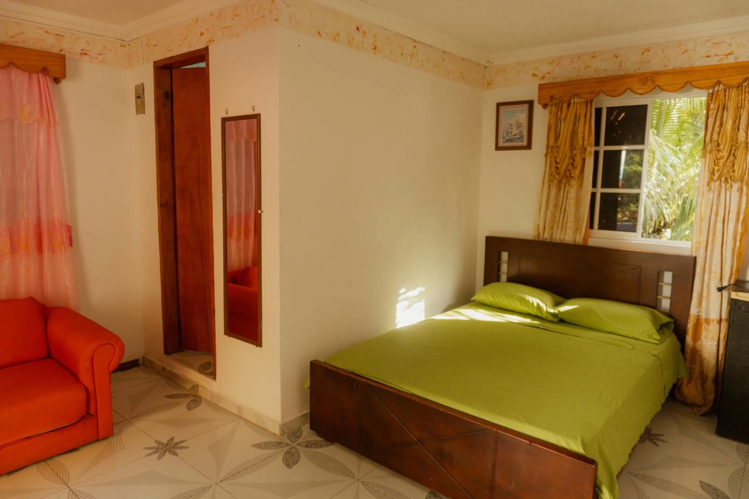 Bed in POSADA NATIVA DERMA´S INN