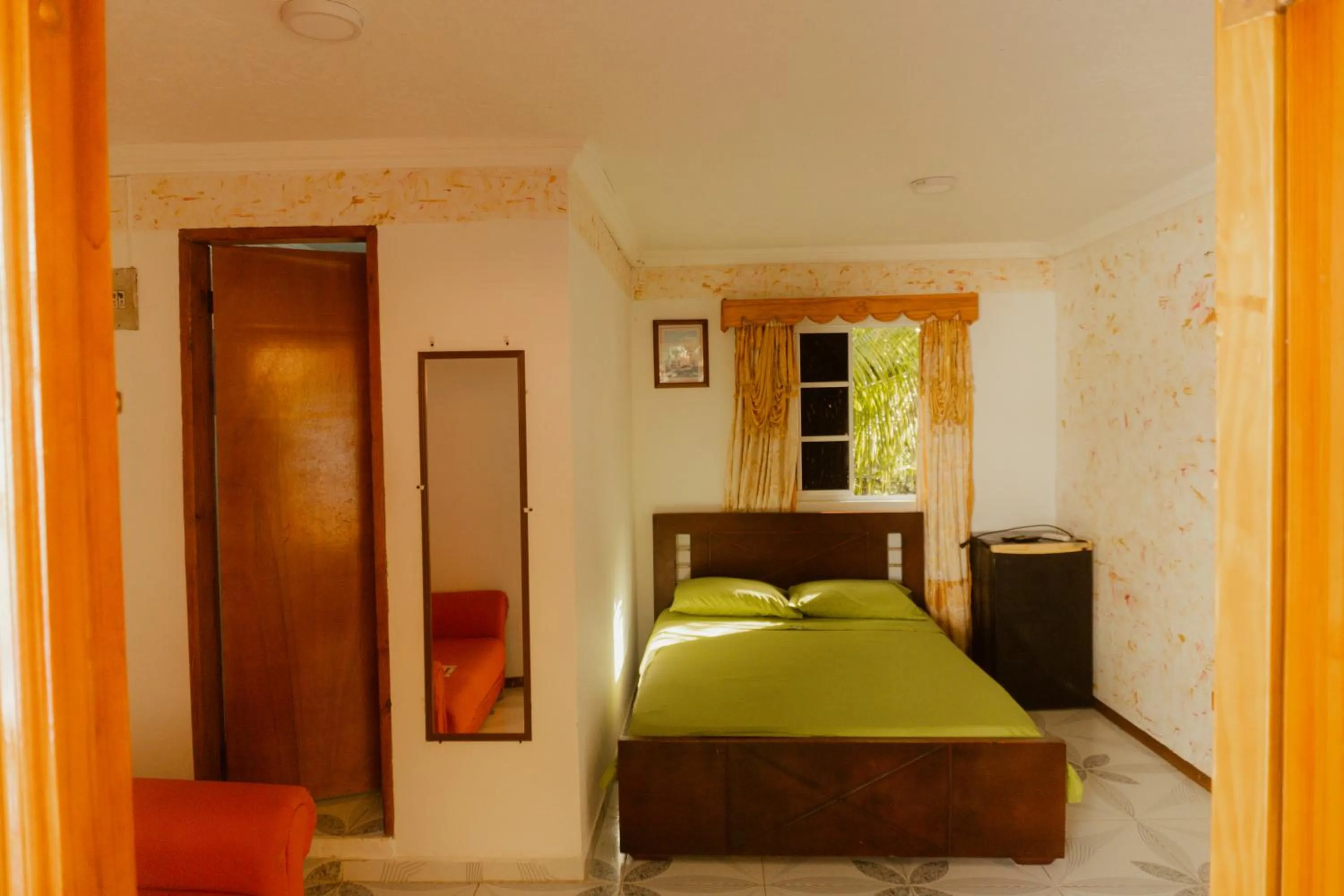 Bed in POSADA NATIVA DERMA´S INN