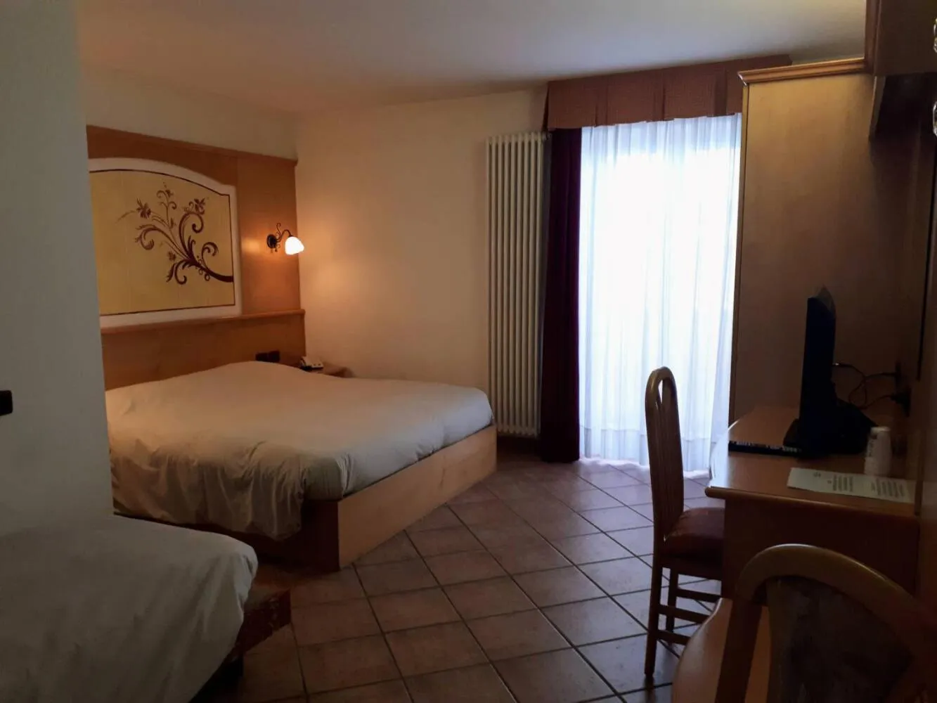 Bed in Hotel Orchidea