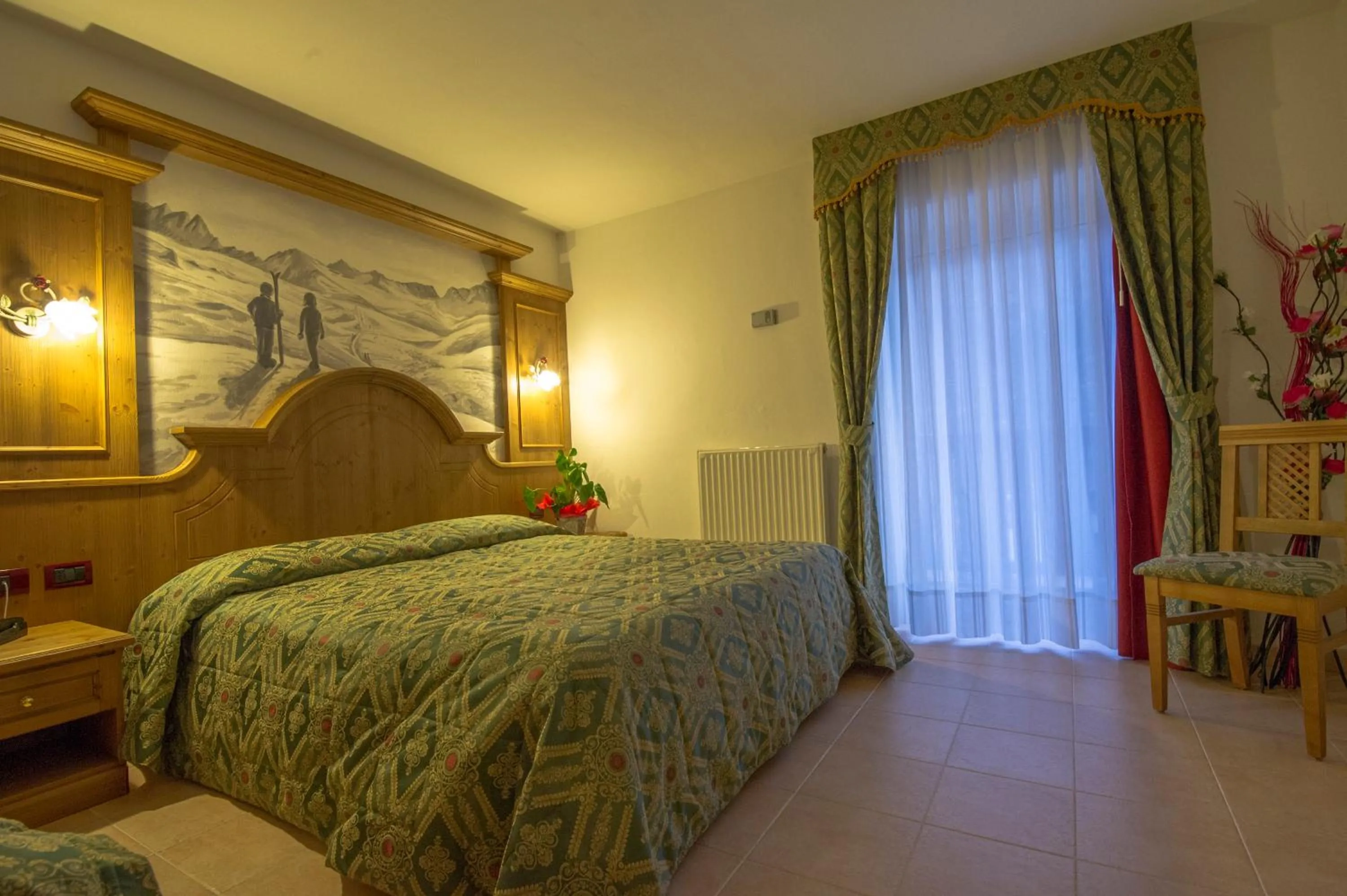 Bed in Hotel Orchidea