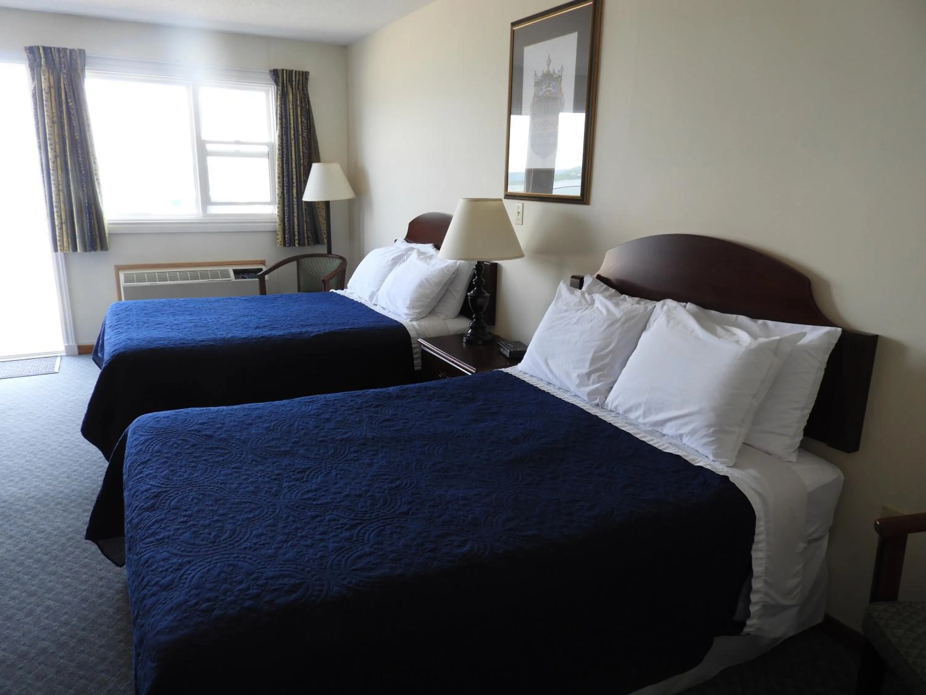 Bedroom, Bed in Admiral Digby Inn Restaurant and Cottages