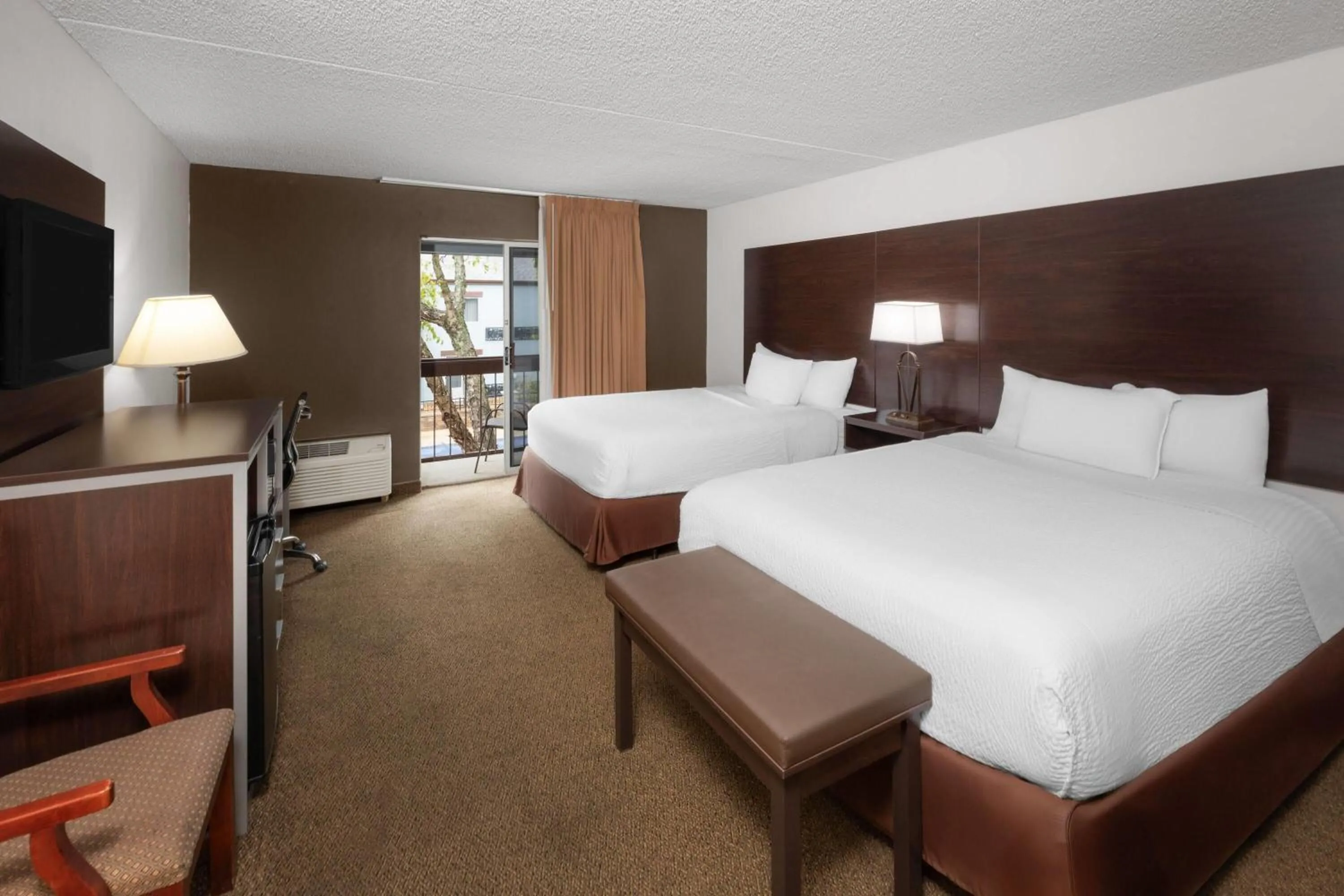 Photo of the whole room, Bed in Endeavor Inn & Suites, Trademark Collection by Wyndham