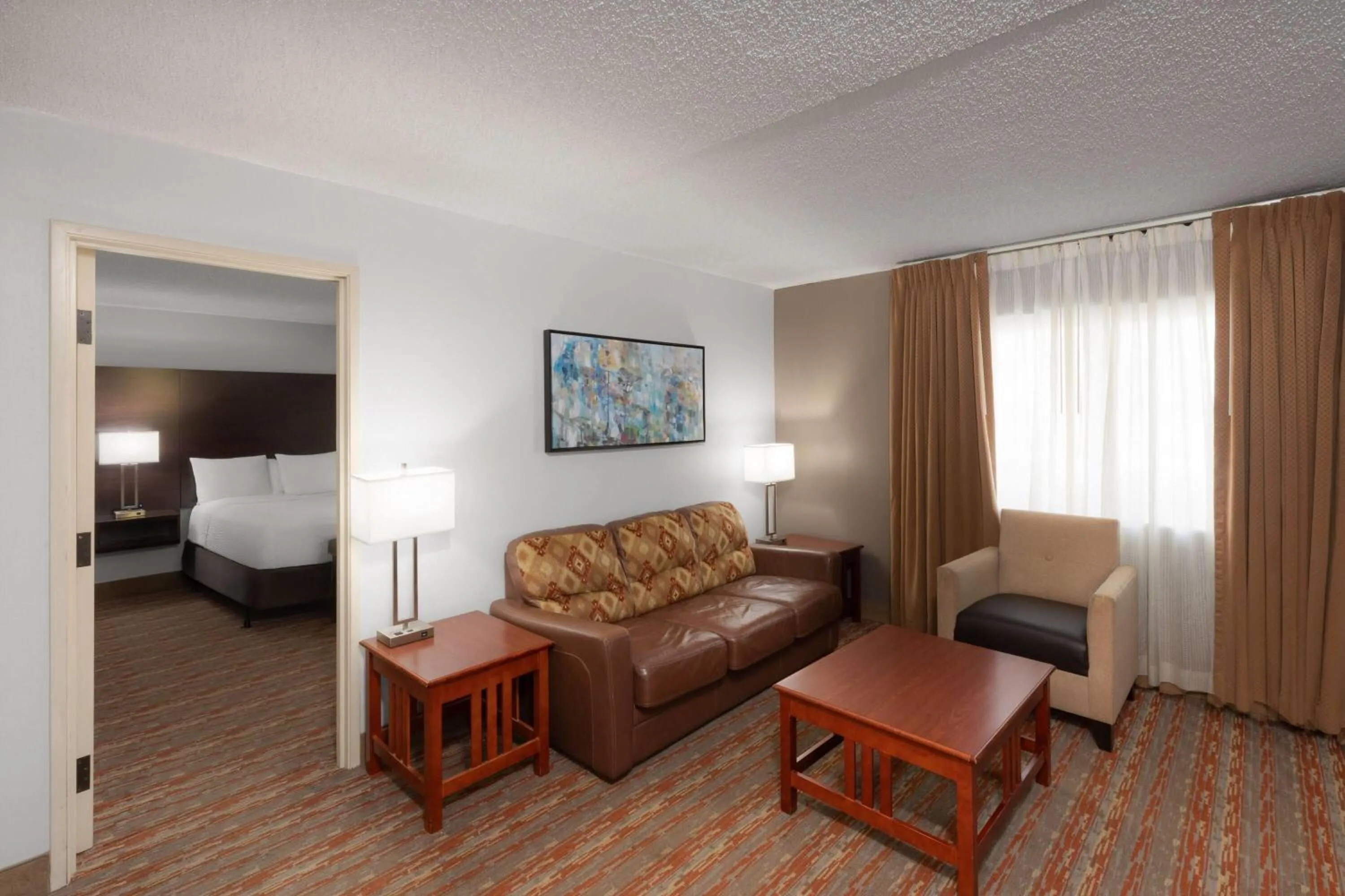 Photo of the whole room, Bed in Endeavor Inn & Suites, Trademark Collection by Wyndham