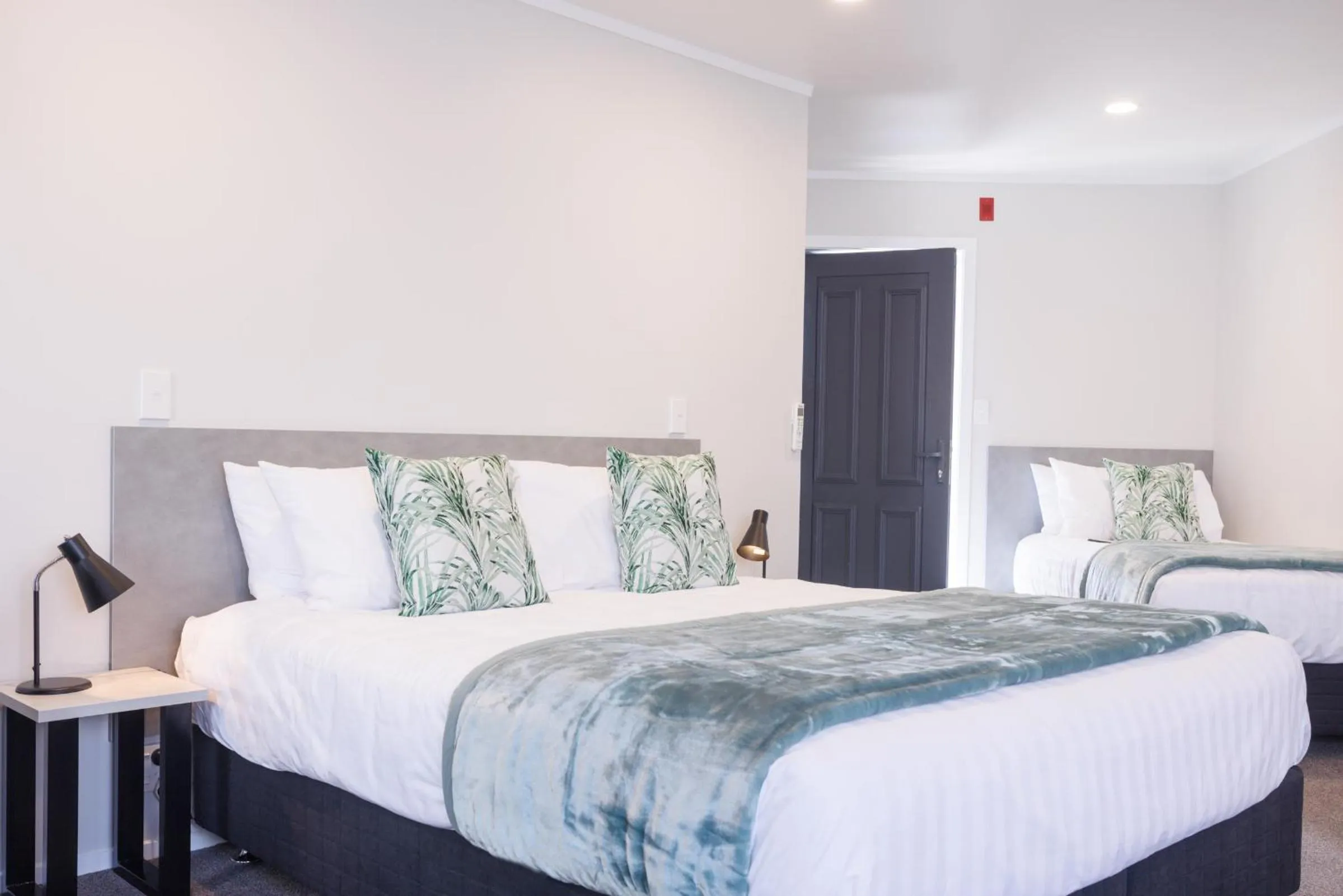 Bed in BK's Pohutukawa Lodge