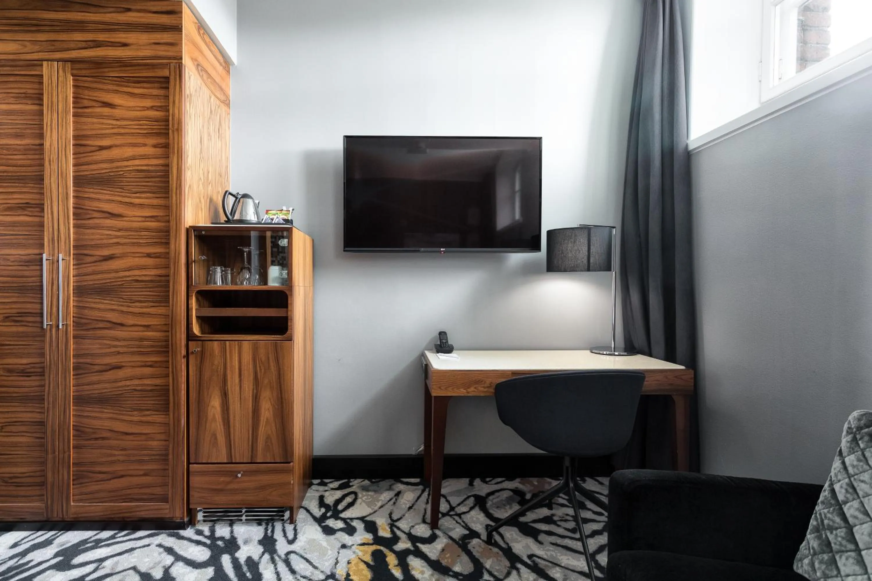 TV and multimedia in Hotel Katajanokka, Helsinki, a Tribute Portfolio Hotel