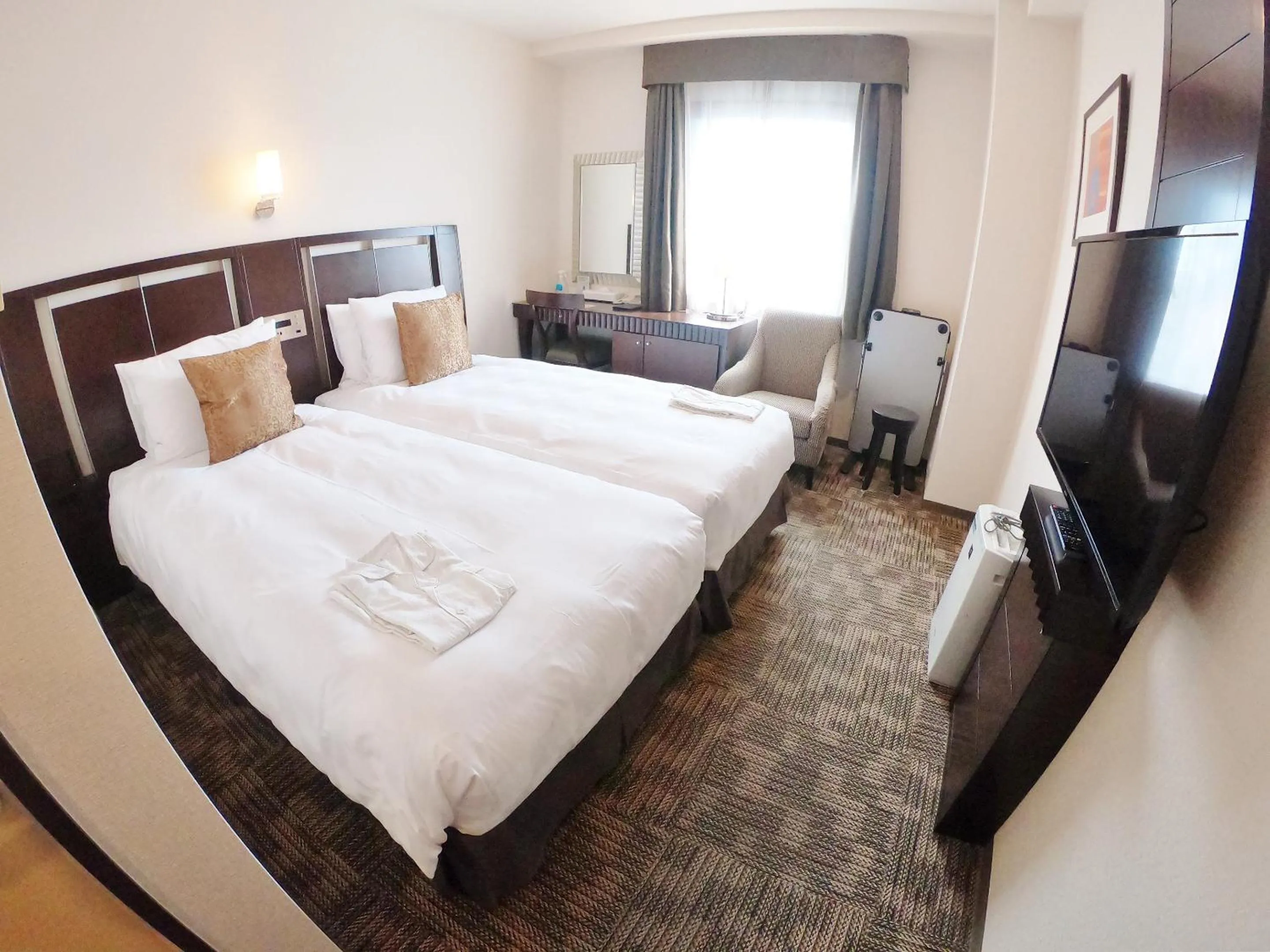 Photo of the whole room, Bed in Sol Vita Hotel Naha