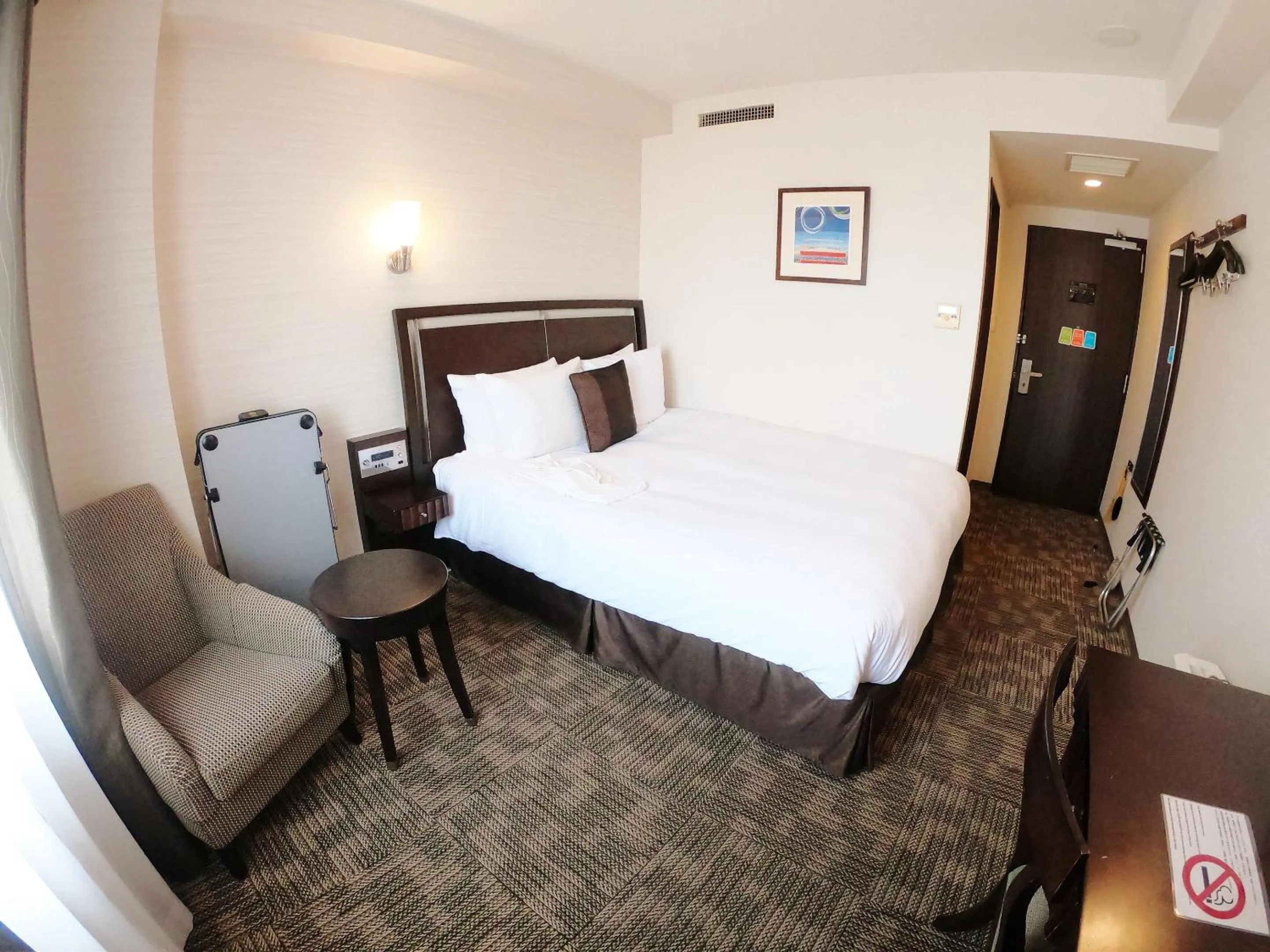 Photo of the whole room, Bed in Sol Vita Hotel Naha