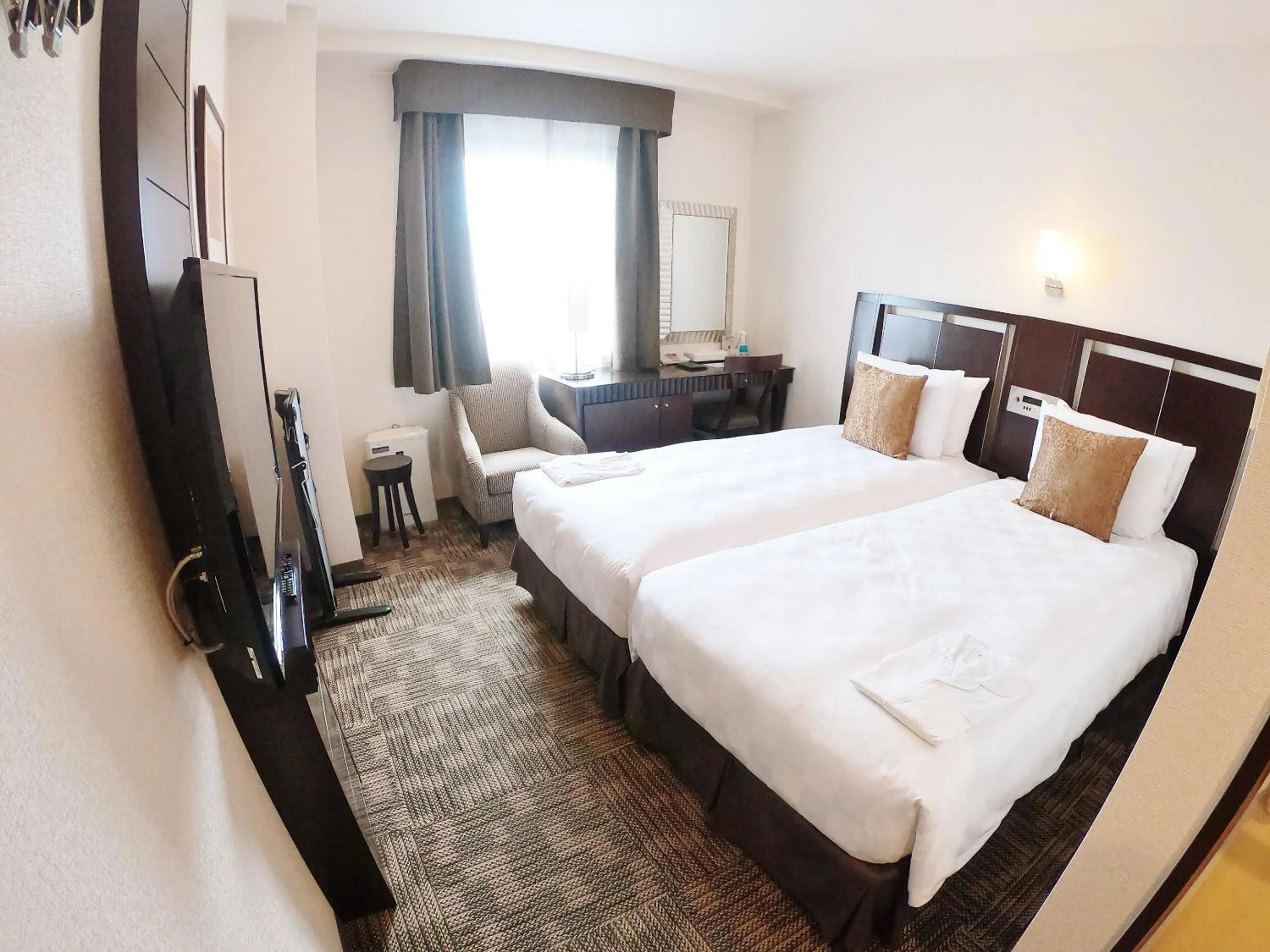 Photo of the whole room, Bed in Sol Vita Hotel Naha