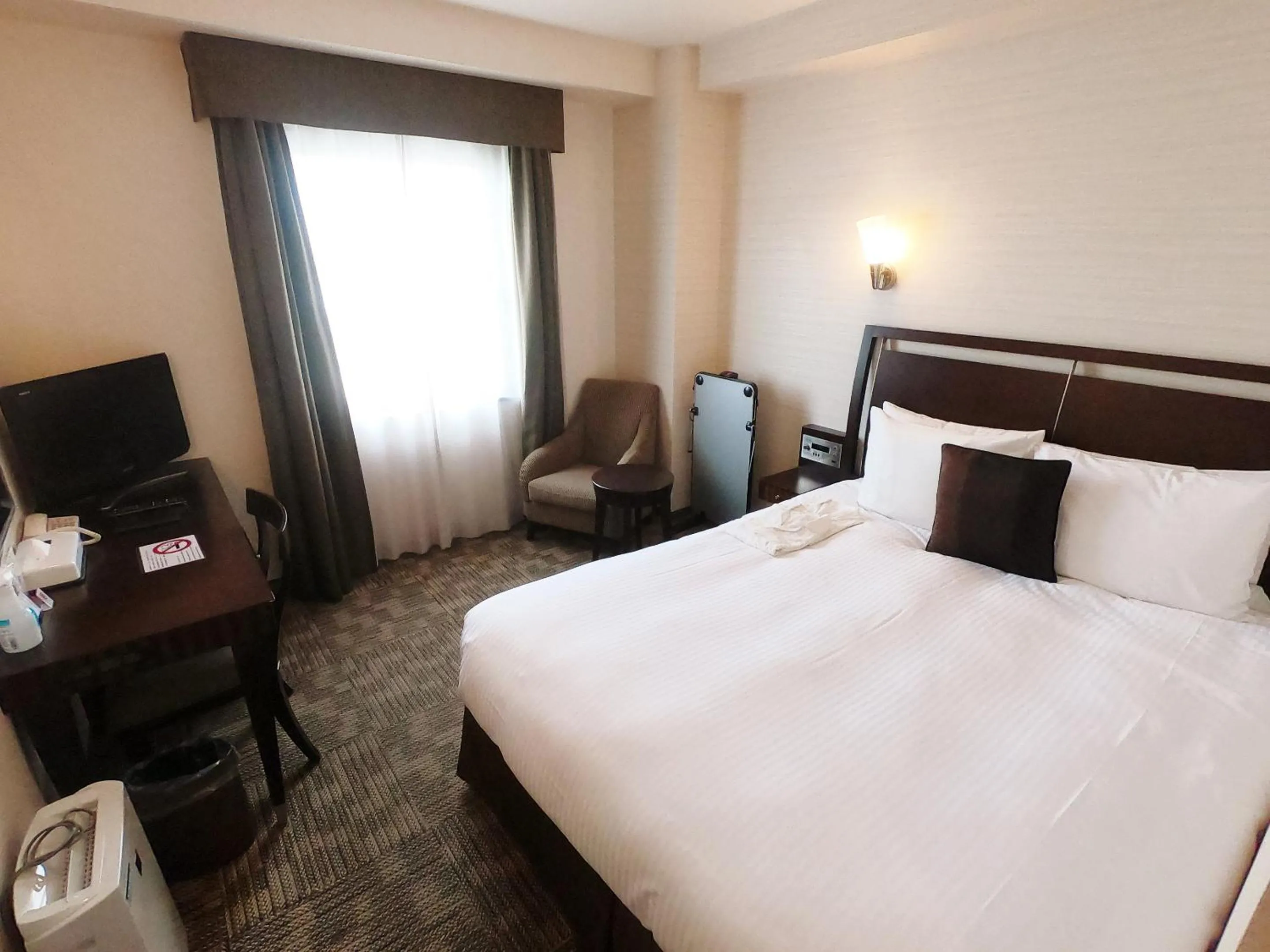 Photo of the whole room, Bed in Sol Vita Hotel Naha