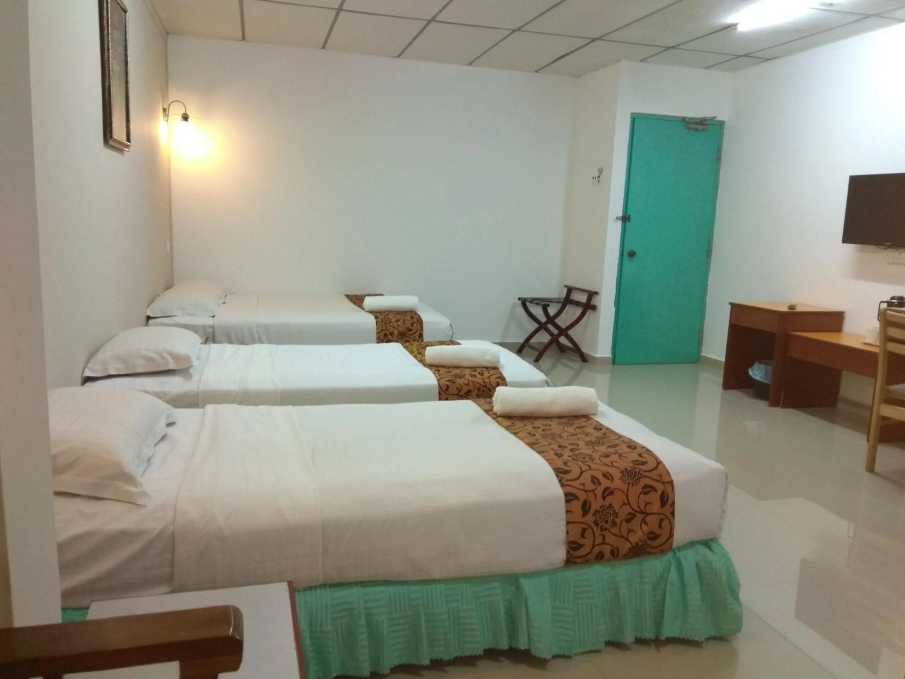 Bed in Hotel K T Mutiara