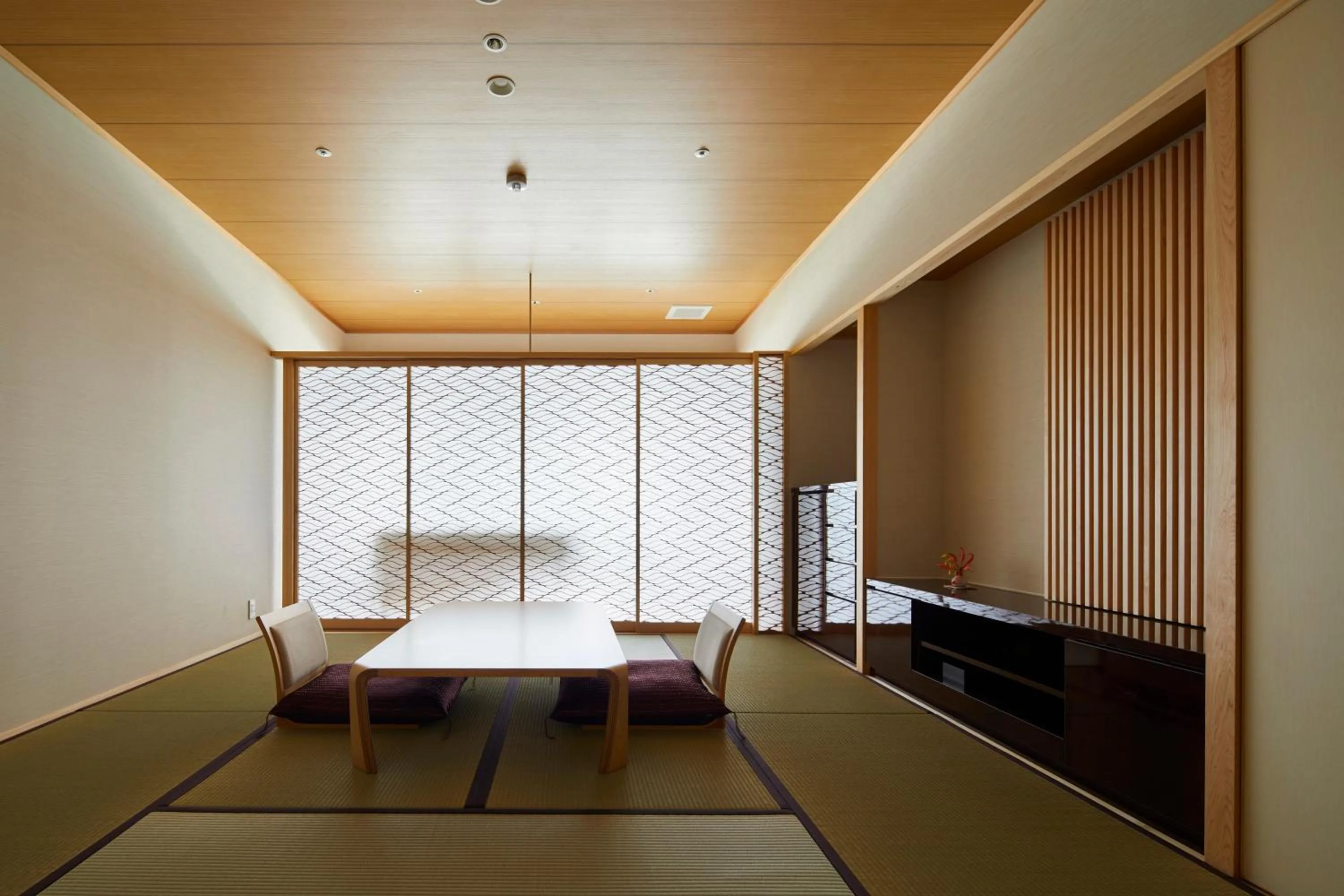 Living room, Bed in Hotel Sanrakuso