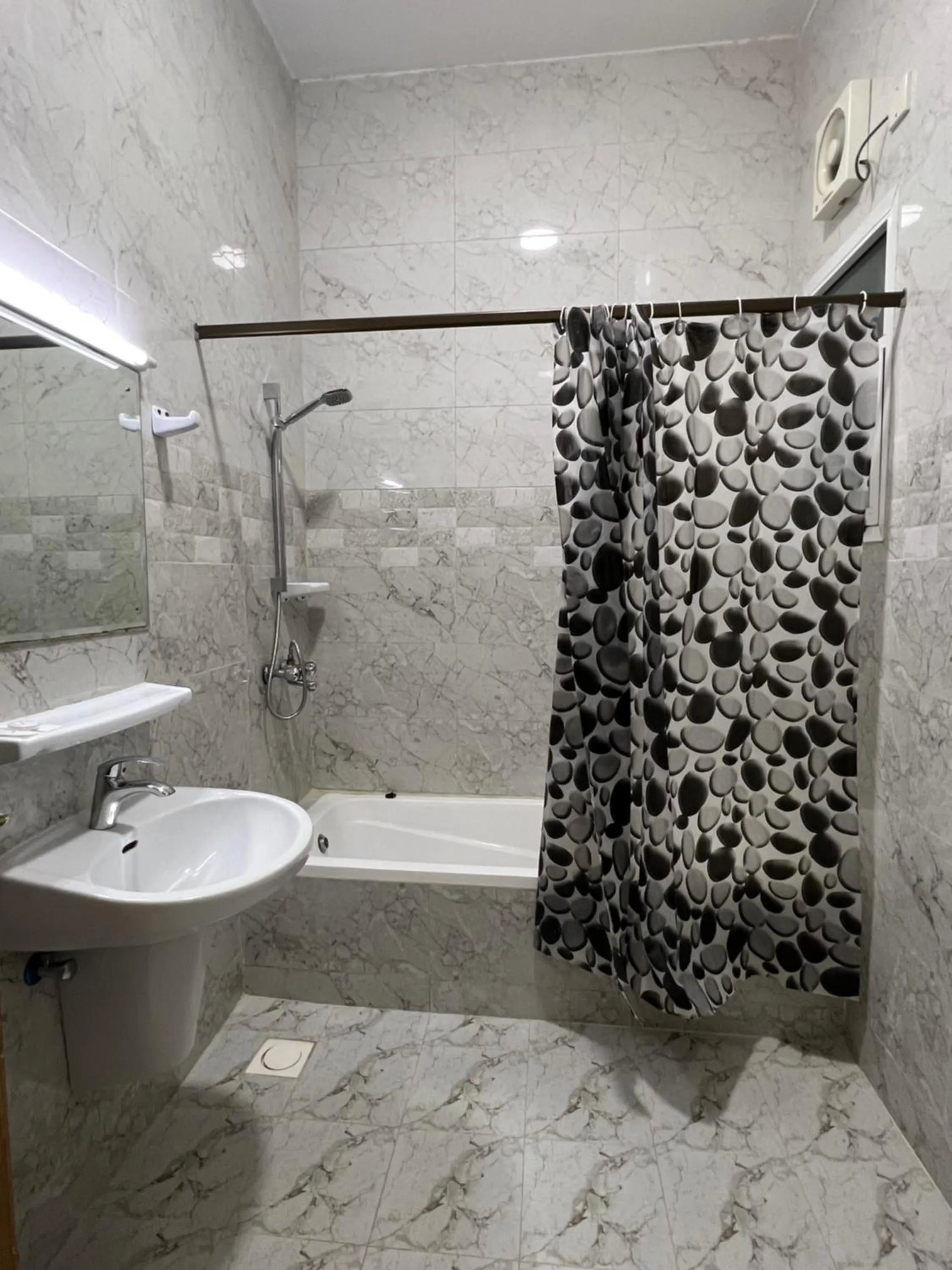 Shower in Atlas Hotel Apartments