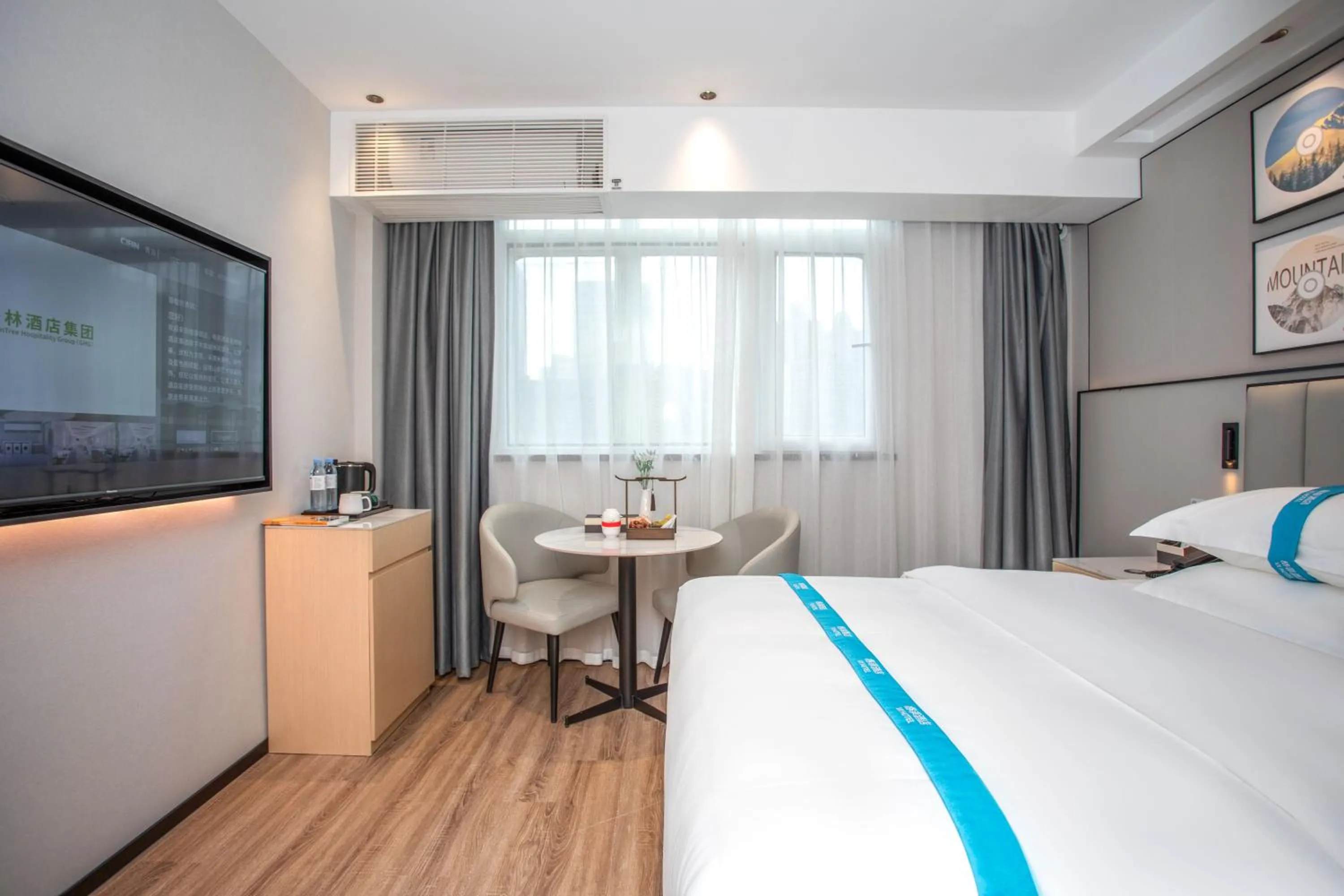 Bed in VX Hotel Shanghai Yixian Road Dabaishu