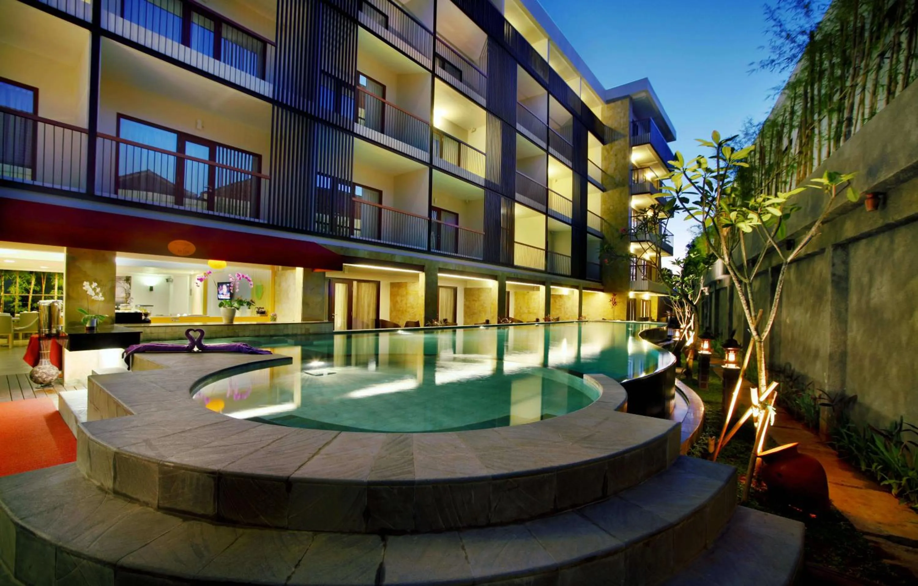 Swimming pool in Quest Hotel Kuta by ASTON