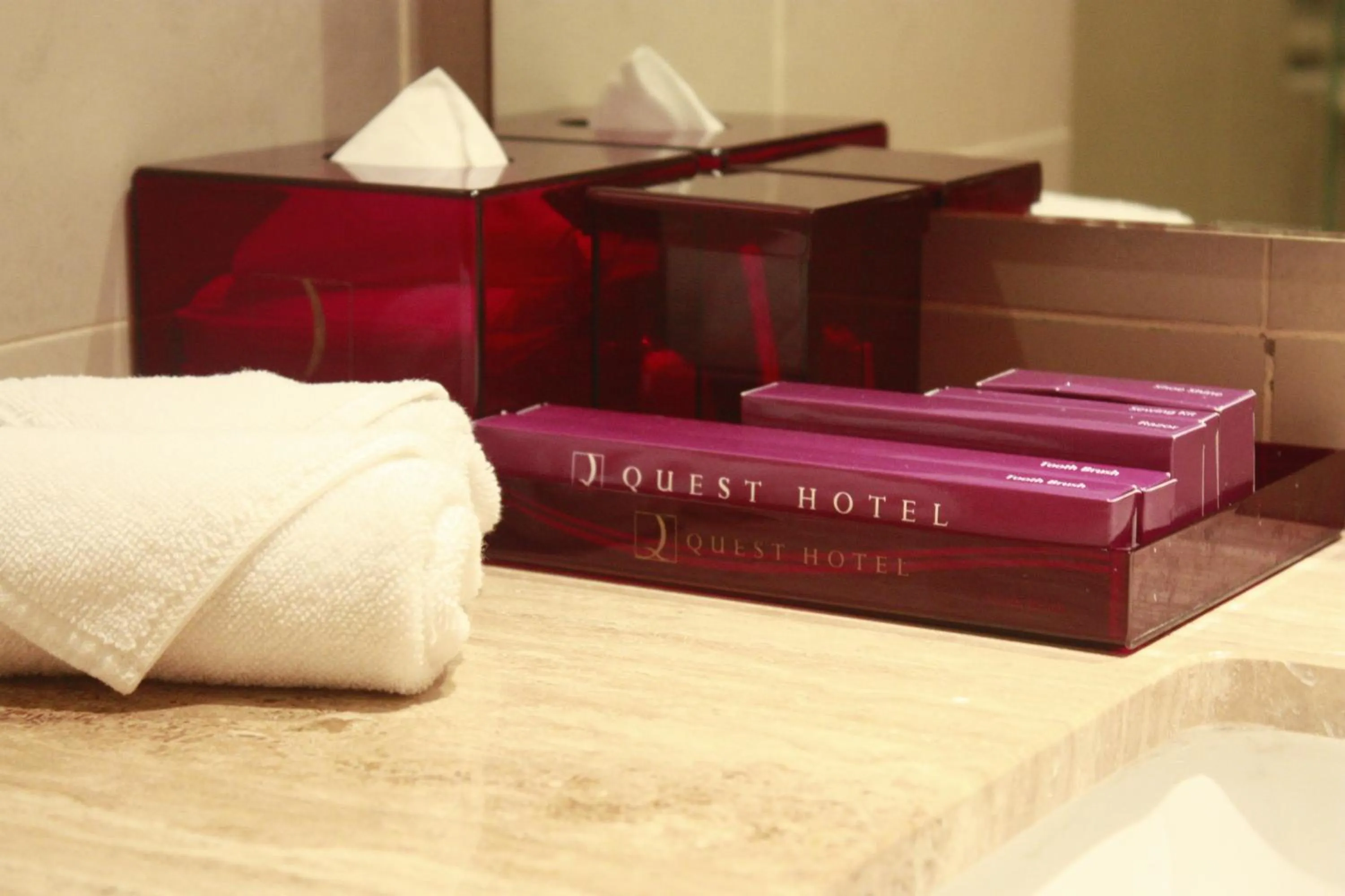 Toilet, Bed in Quest Hotel Kuta by ASTON