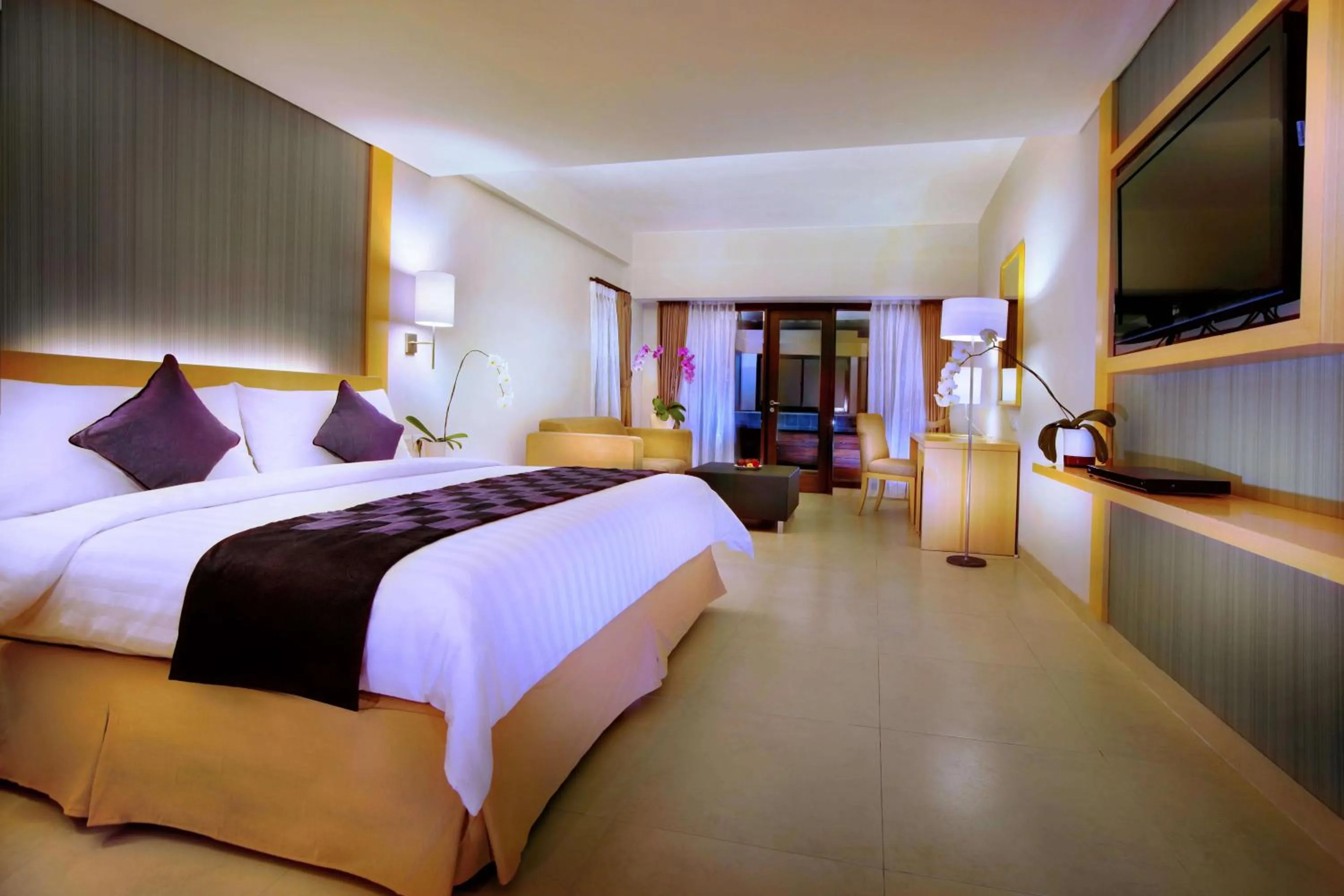 Photo of the whole room, Bed in Quest Hotel Kuta by ASTON