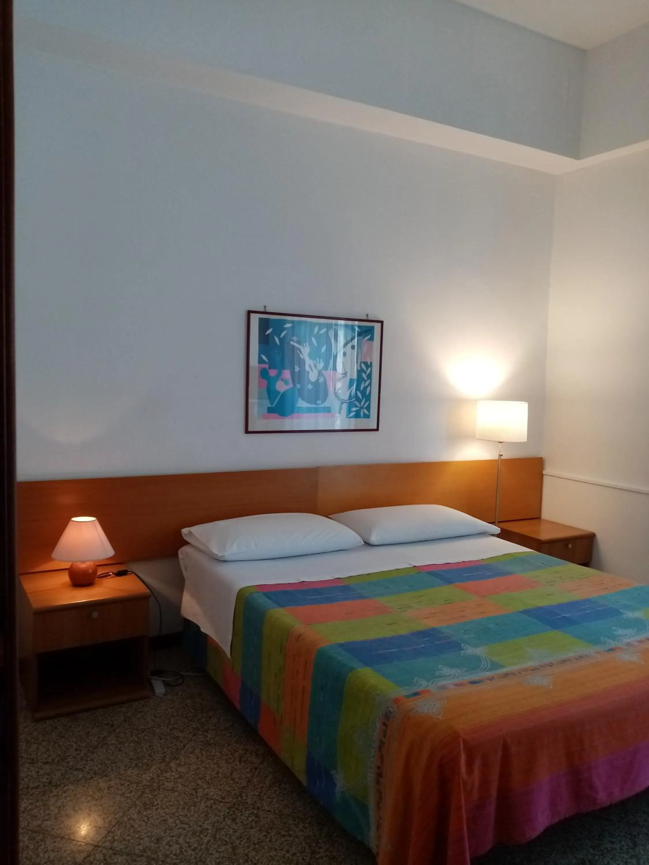 Bed in Ariston Petit Hotel