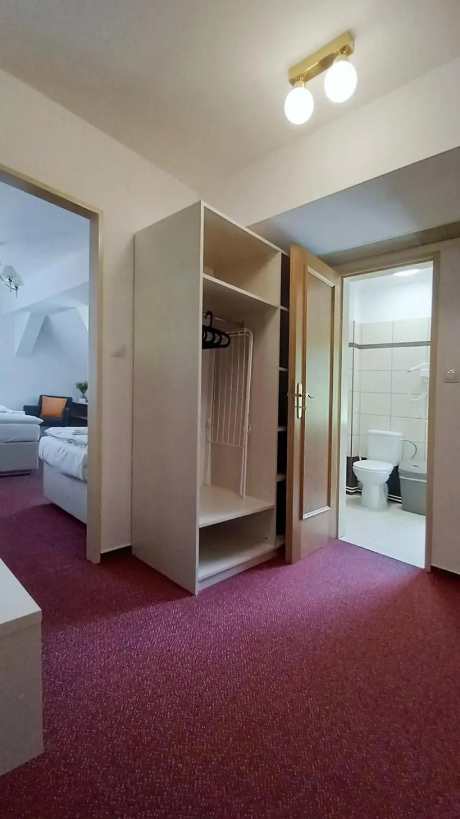 Bathroom, Bed in Hotel Hradec