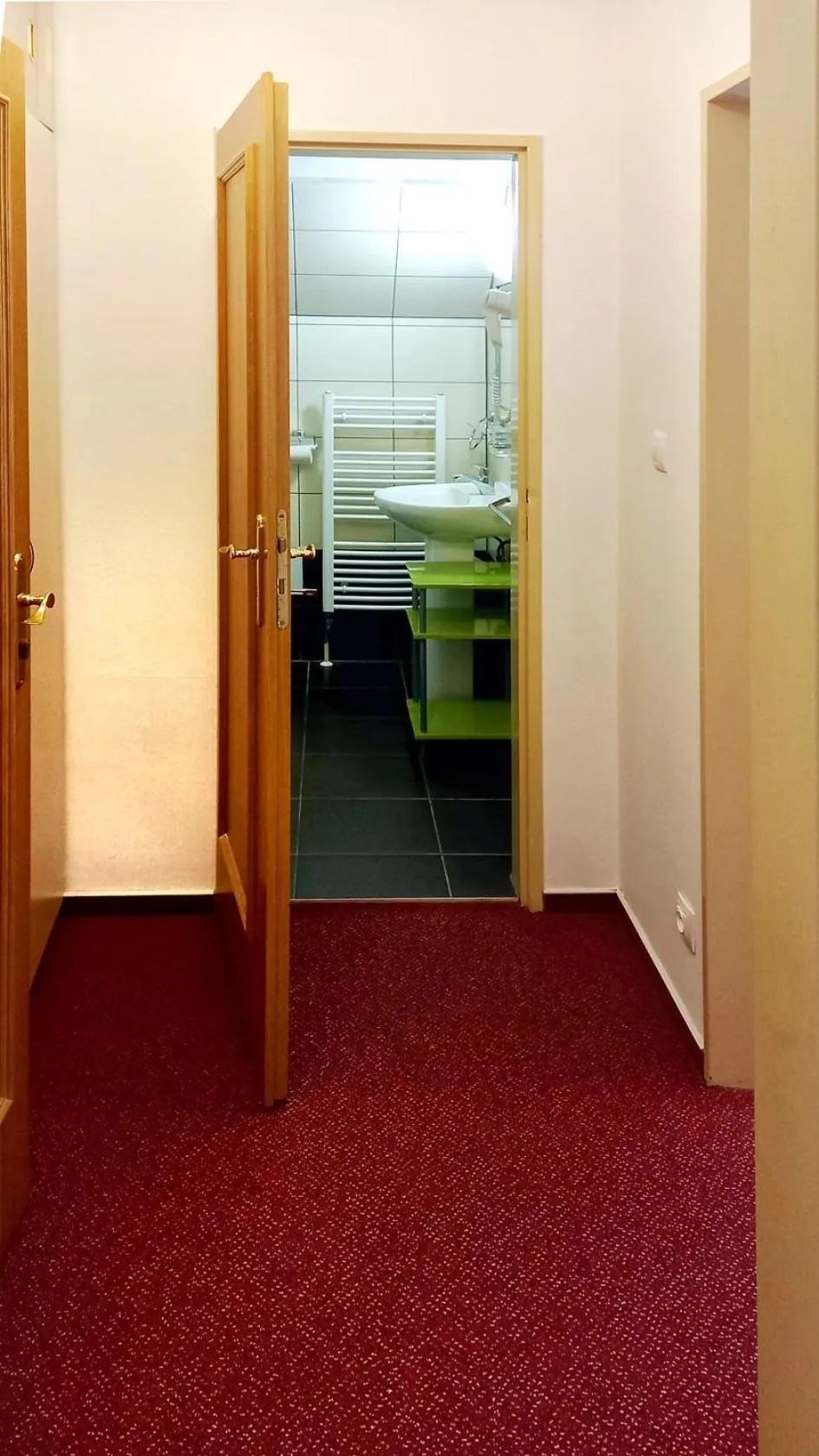 Property building, Bed in Hotel Hradec