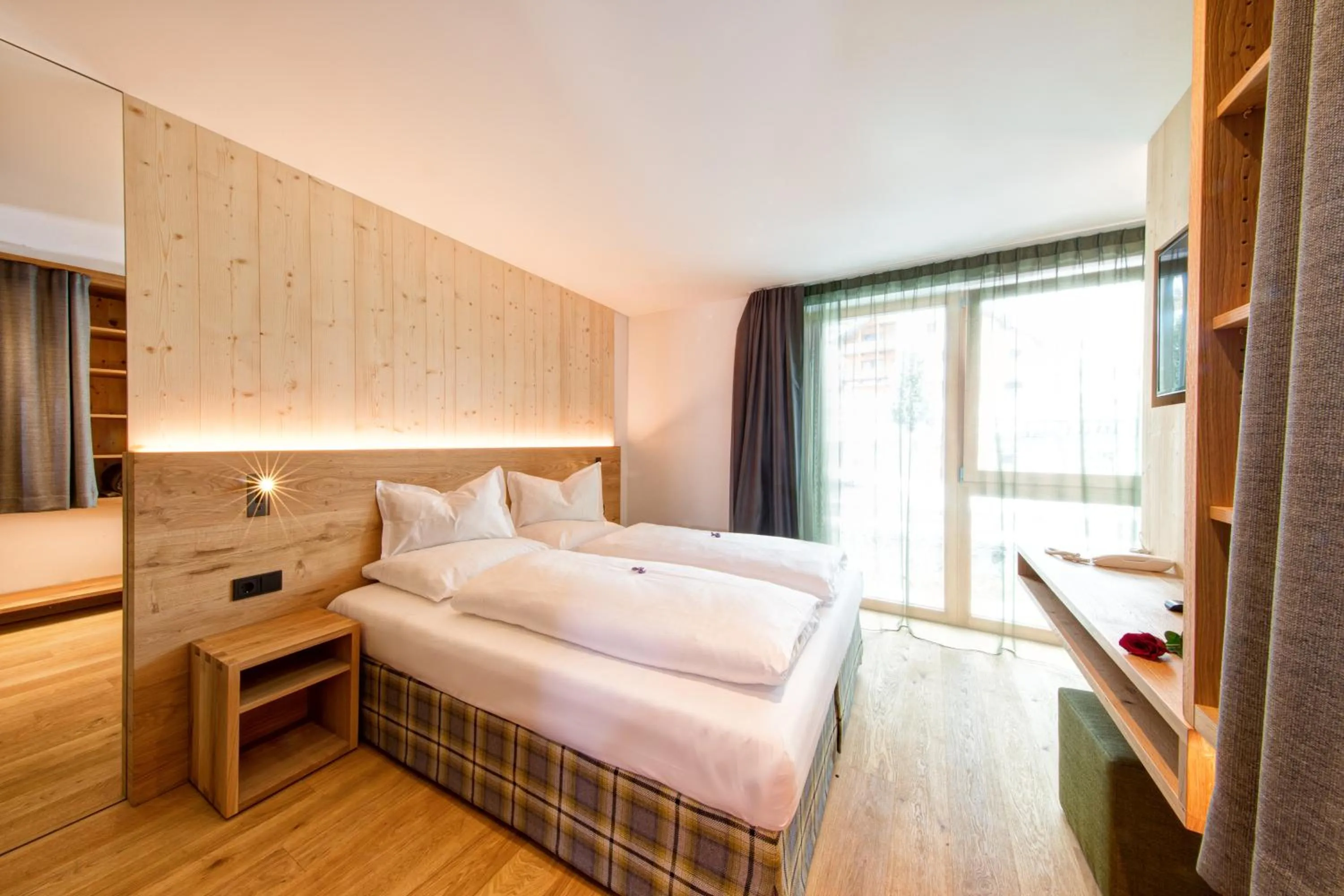 Photo of the whole room, Bed in Mountain Design Hotel Eden Selva