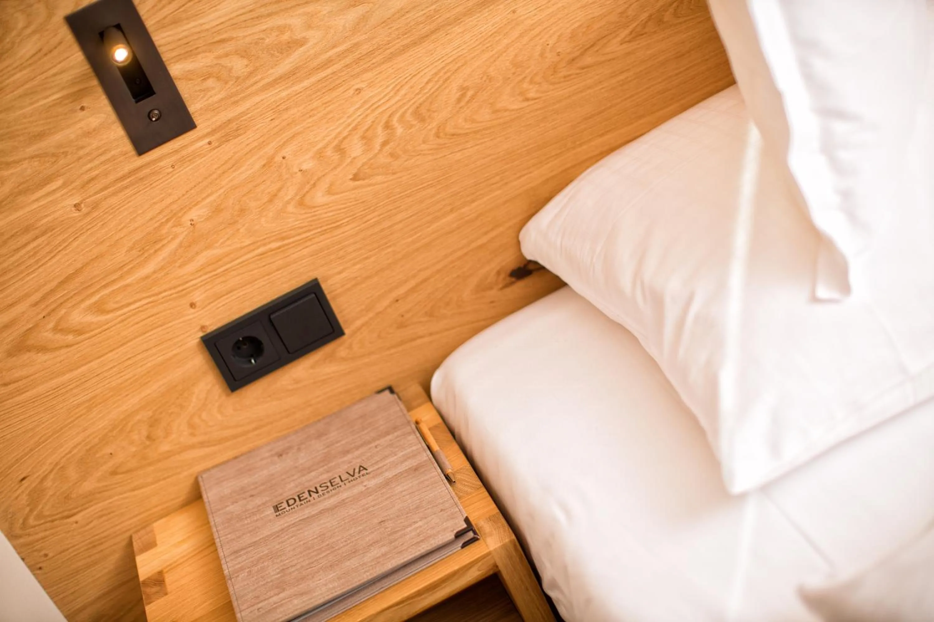 Decorative detail, Bed in Mountain Design Hotel Eden Selva