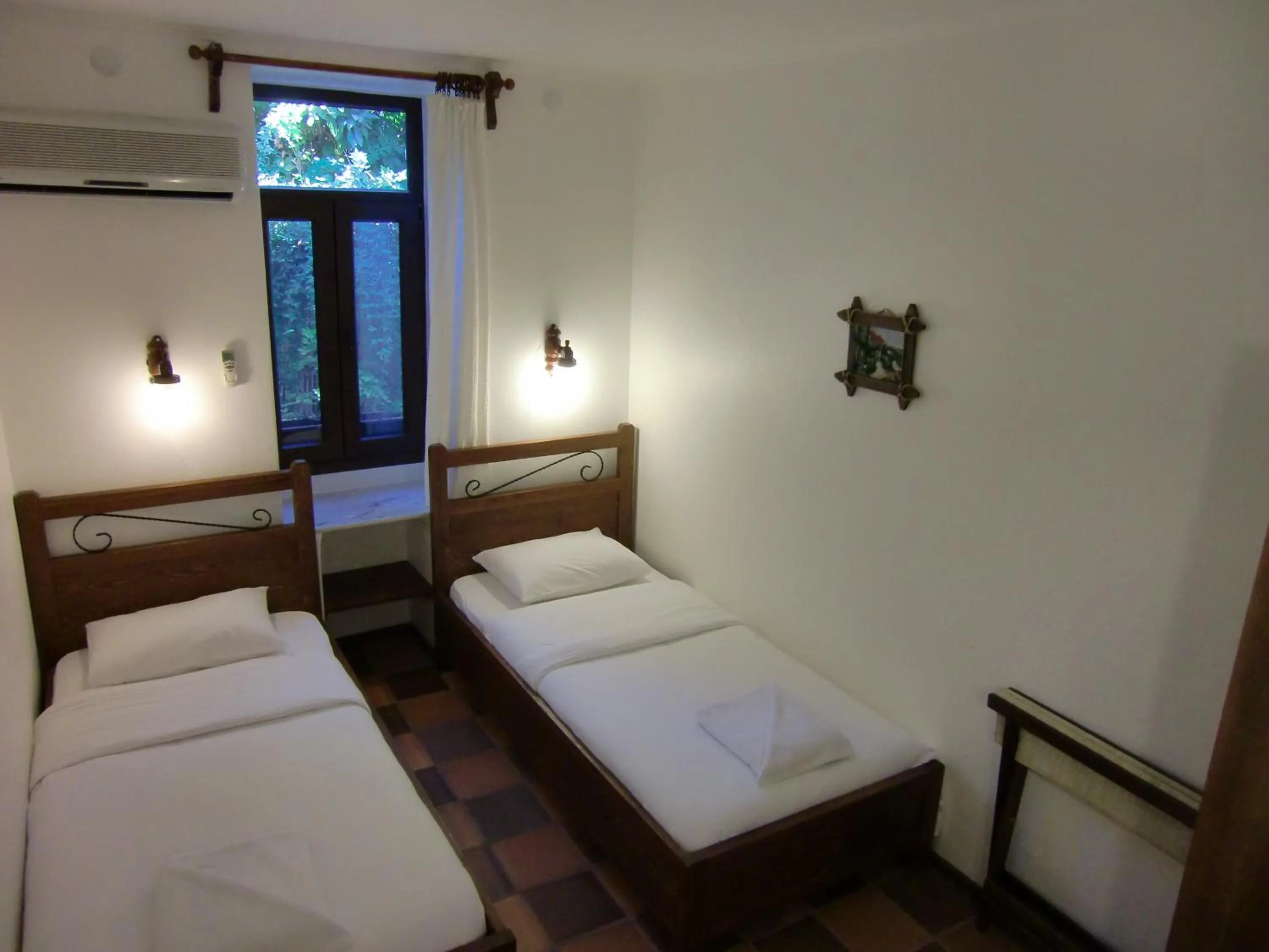 Bed in Hotel Happy Caretta