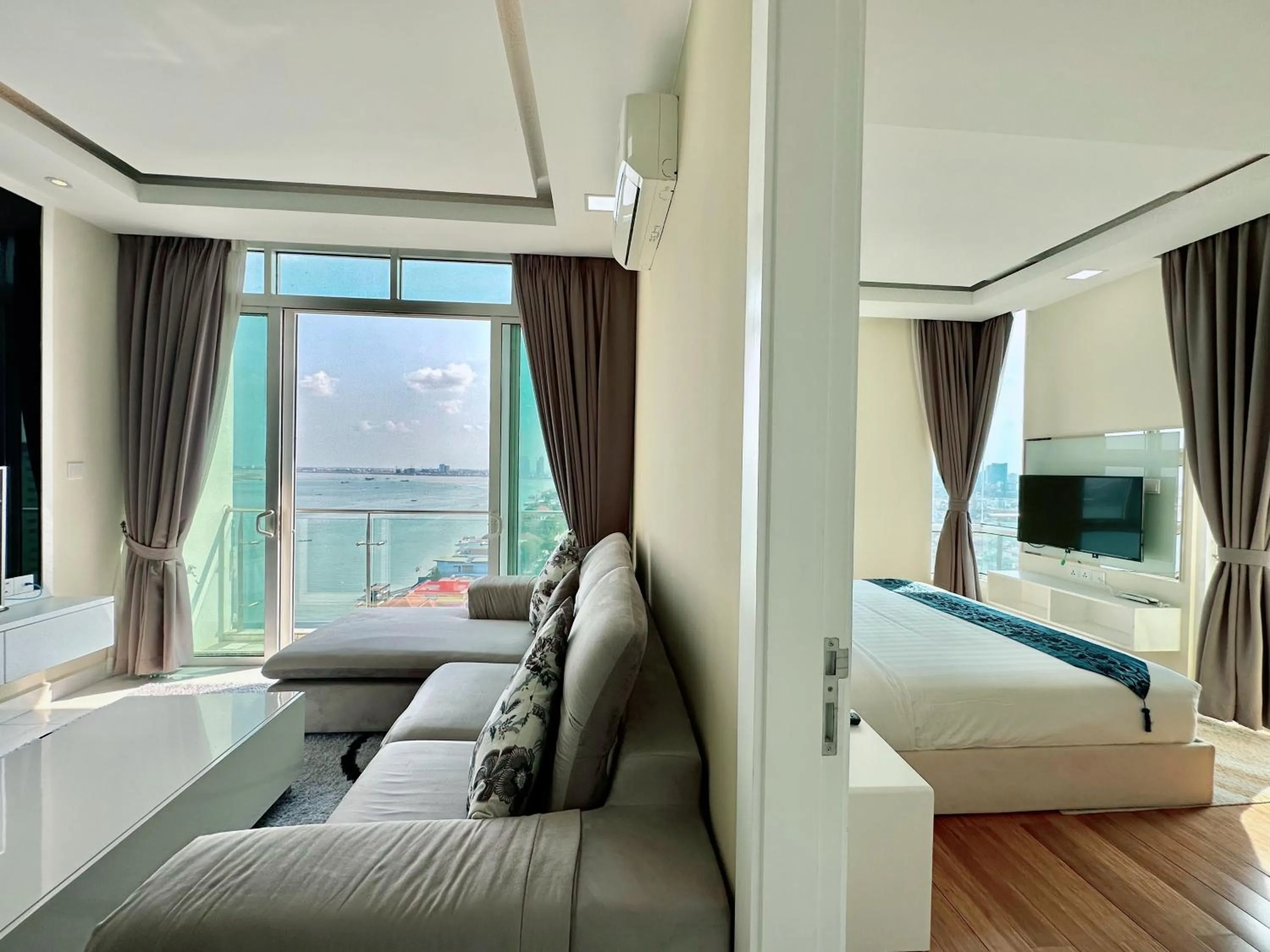 Living room, Bed in Infinity 28 Hotel and Residence