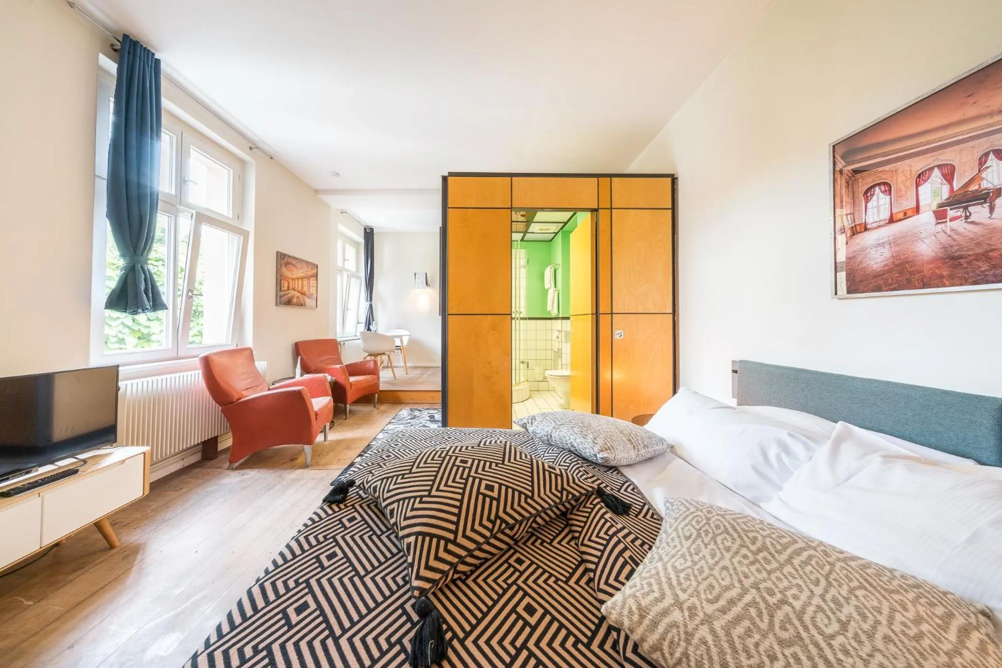 Living room, Bed in Design Apartments - "Im Holländerhaus"